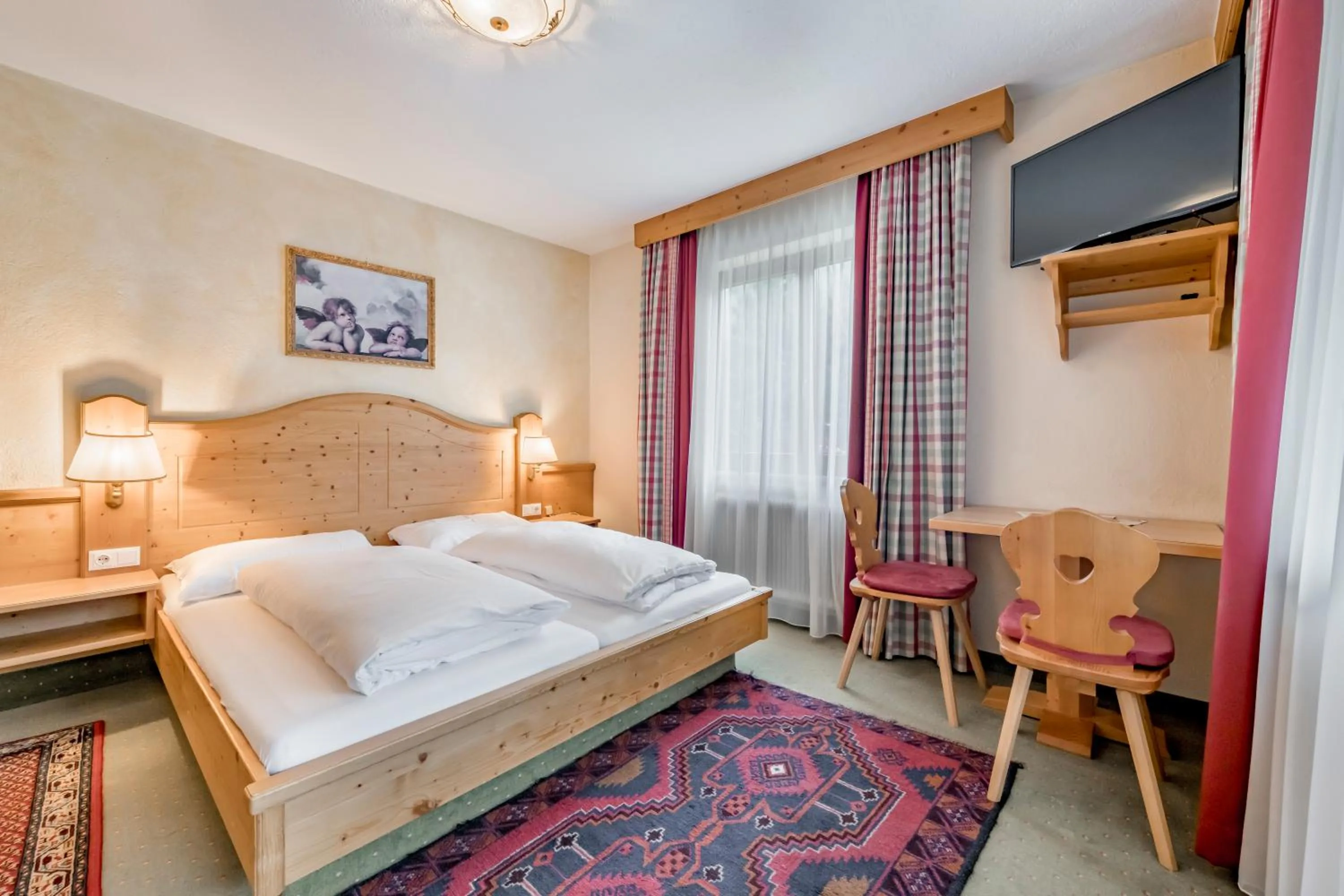 Photo of the whole room, Bed in Pension Almrausch