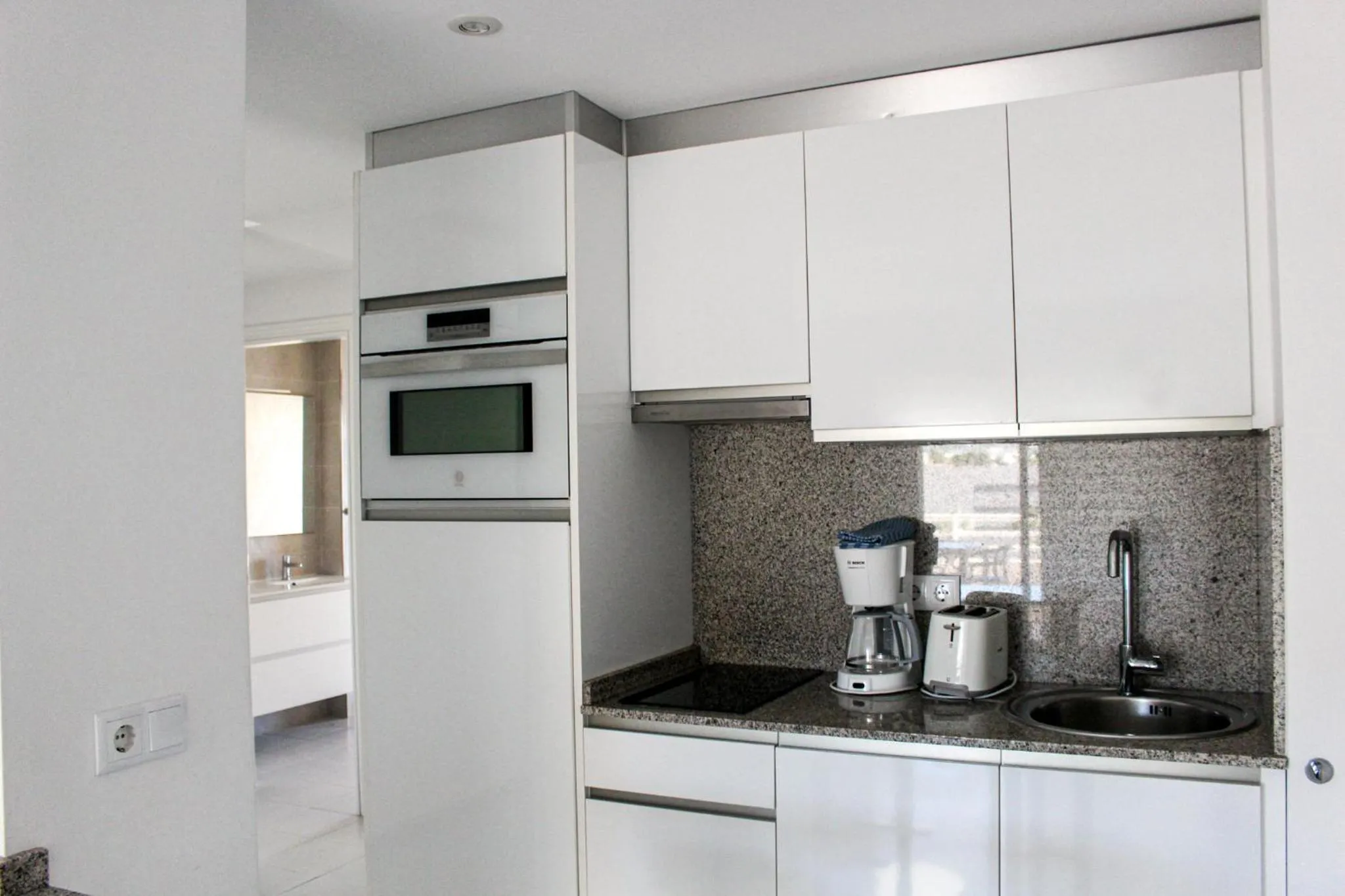 Kitchen or kitchenette in Apartamentos Esmeralda Unitursa