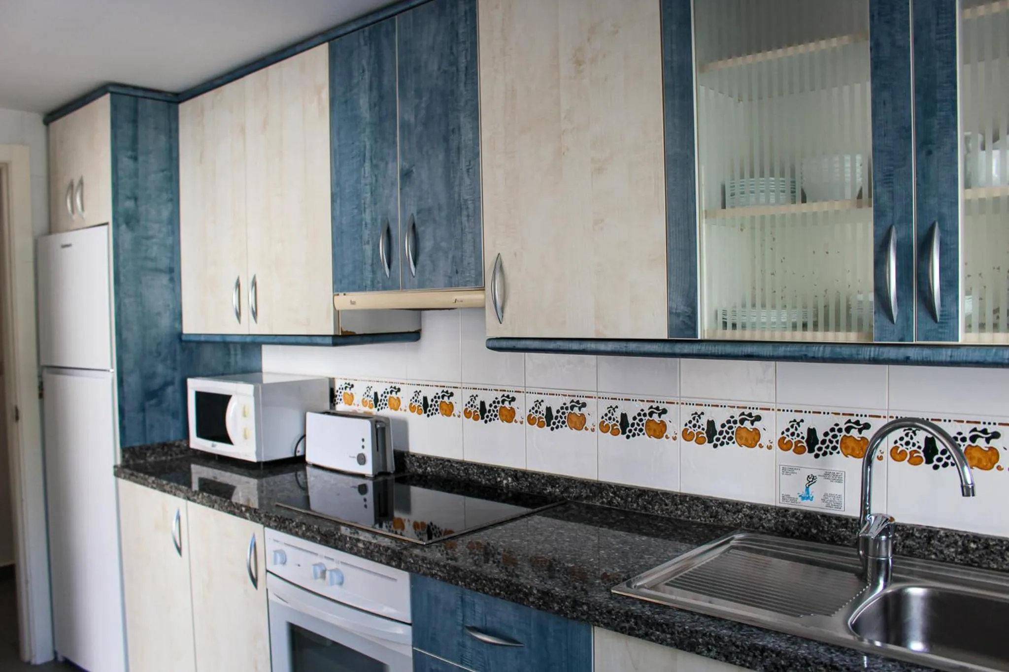 Kitchen or kitchenette in Apartamentos Hipocampos Unitursa