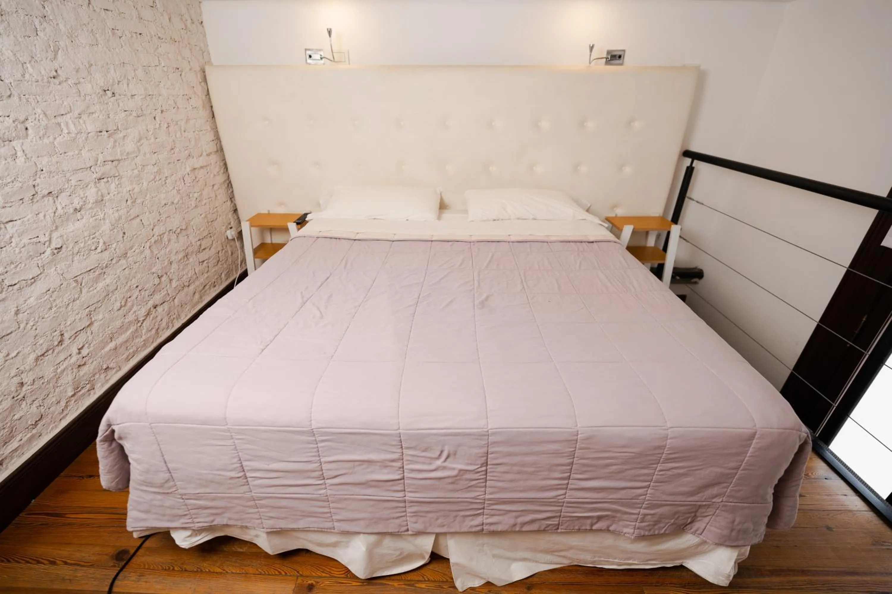 Bed in Loft Osteria by Sagardi