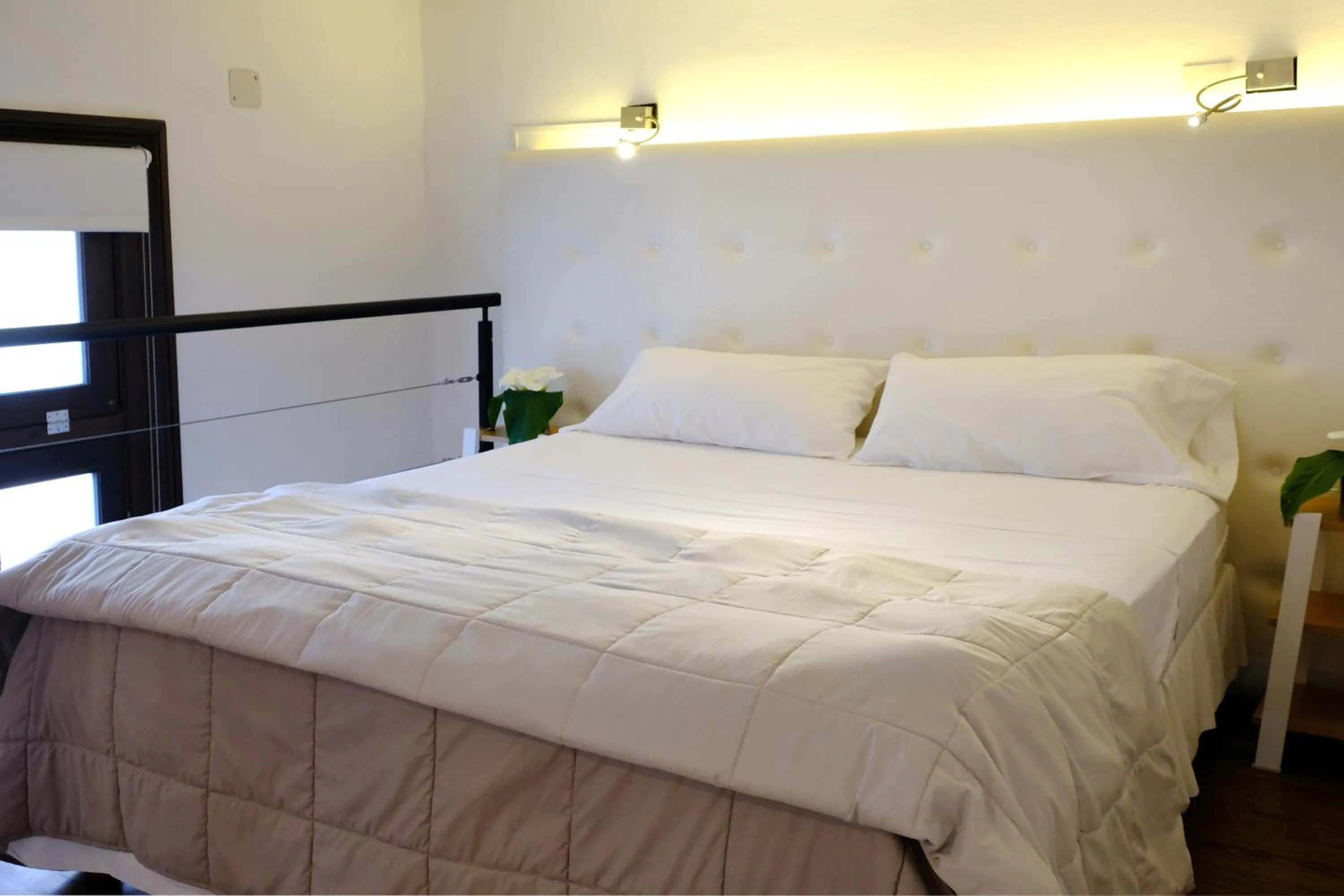 Bed in Loft Osteria by Sagardi