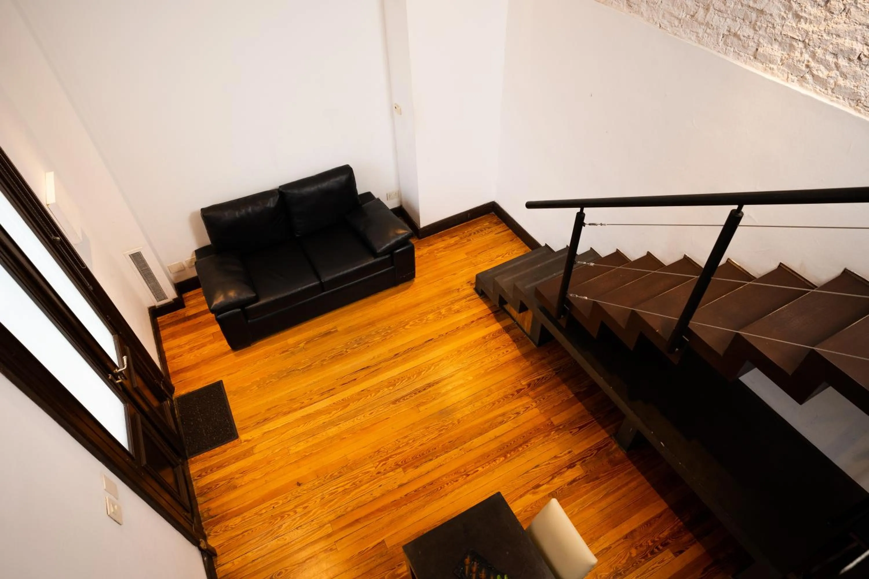 Living room in Loft Osteria by Sagardi