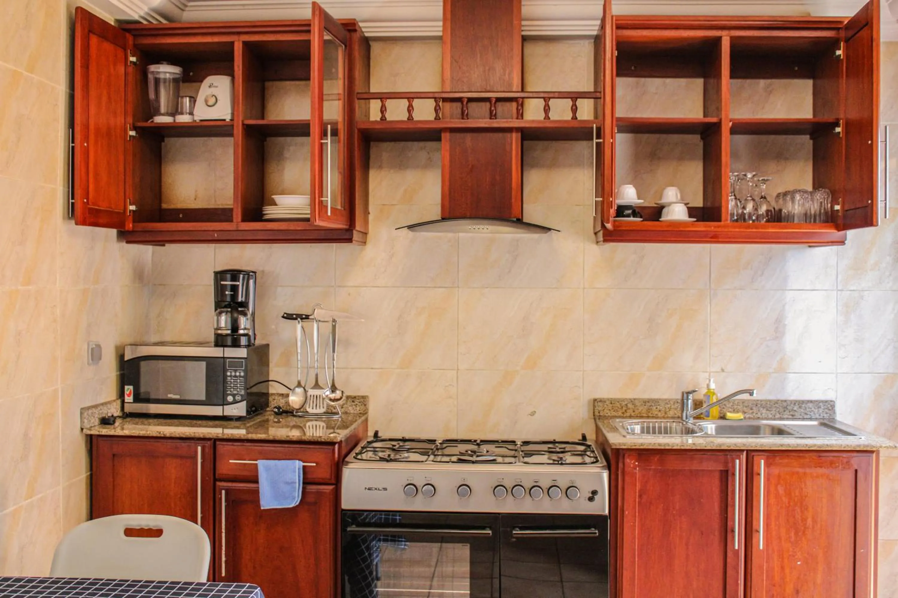 Kitchen or kitchenette in Residence Le Carat Bonapriso