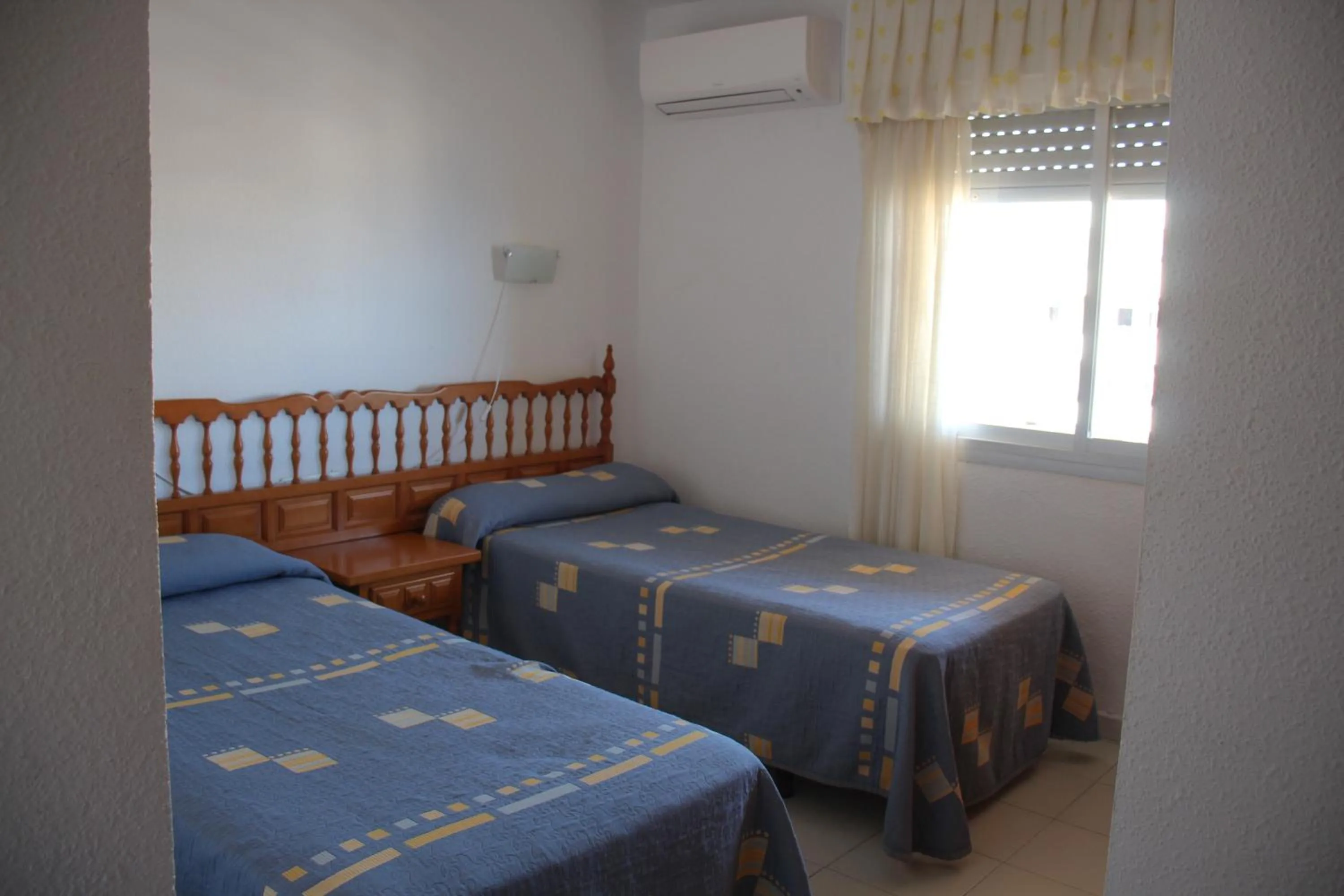 Bed in Apartamentos Turmalina Unitursa