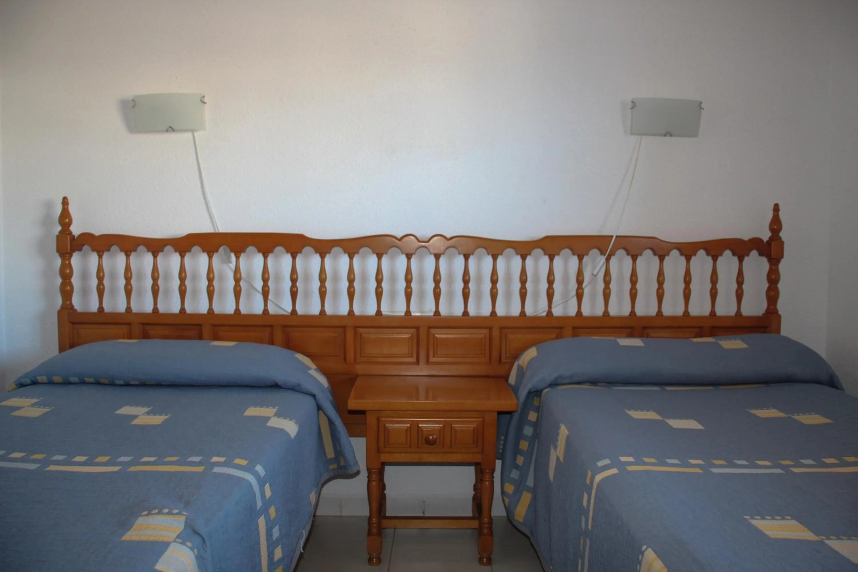 Bed in Apartamentos Turmalina Unitursa