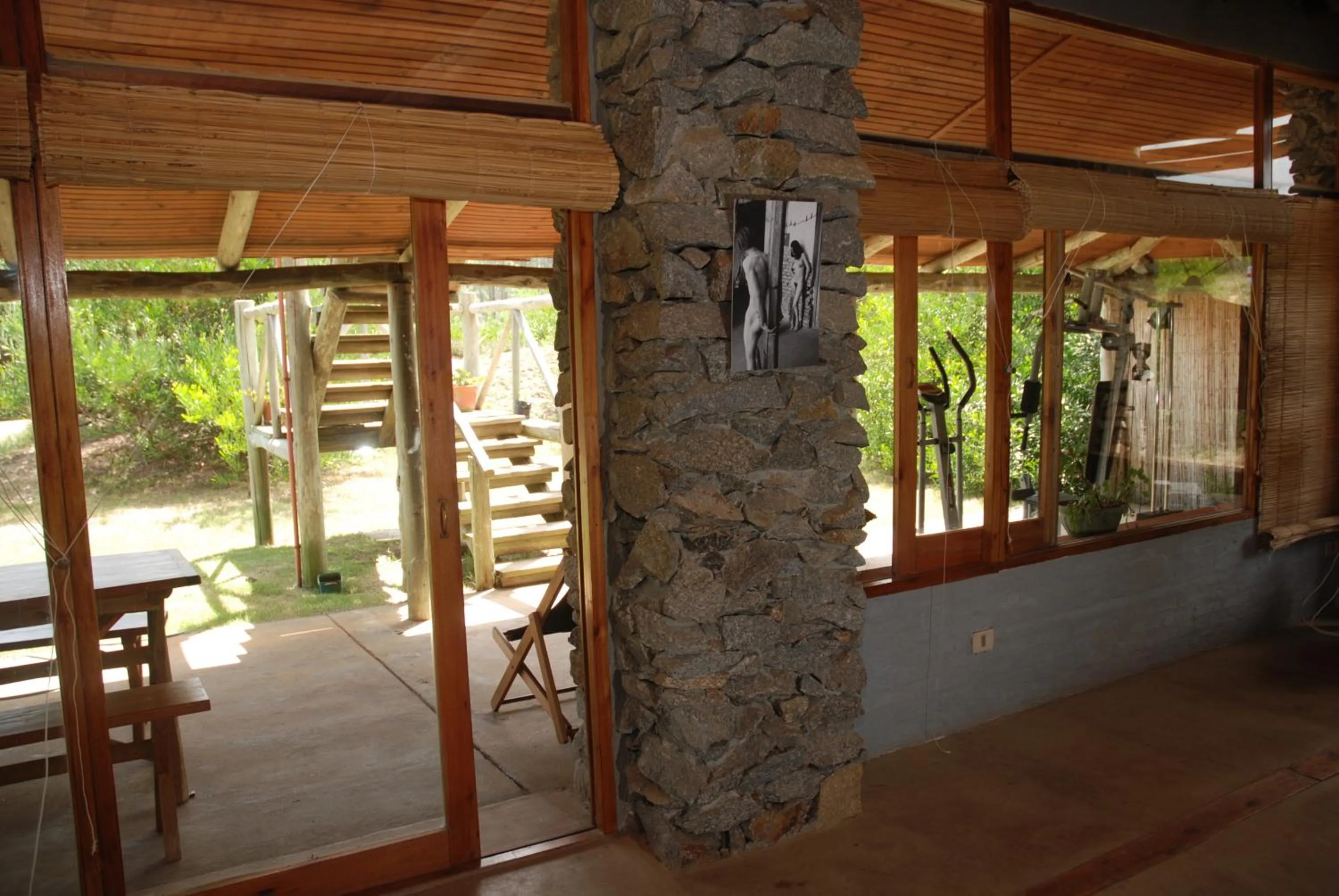 Communal lounge/ TV room in Hotel El Refugio nudista naturista opcional