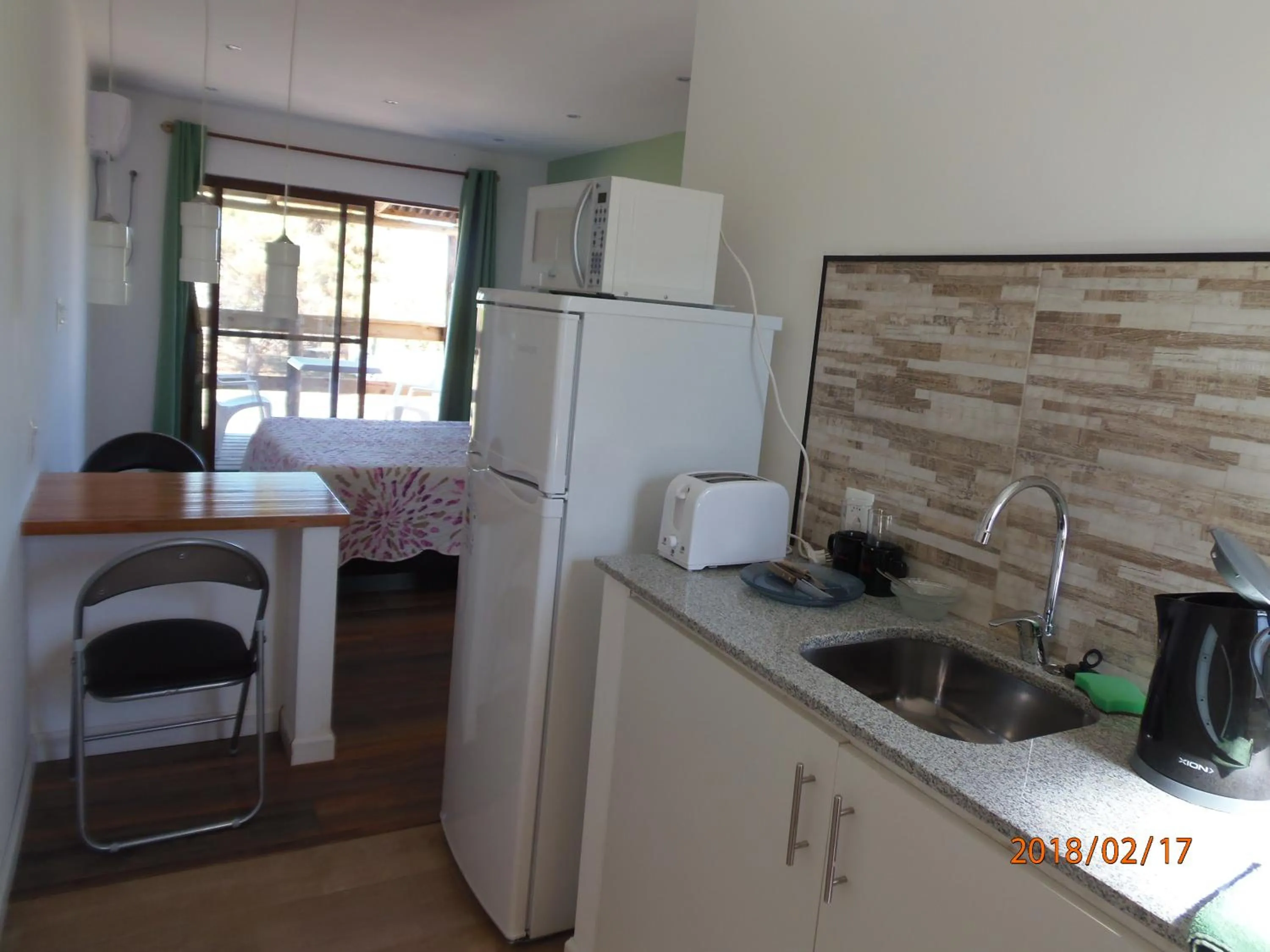 Kitchen or kitchenette in Hotel El Refugio nudista naturista opcional