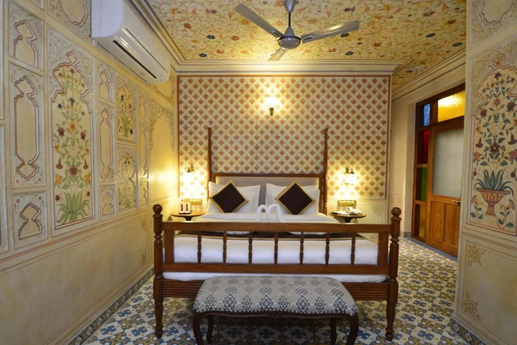 Bed in Nirbana Palace - A Heritage Hotel and Spa