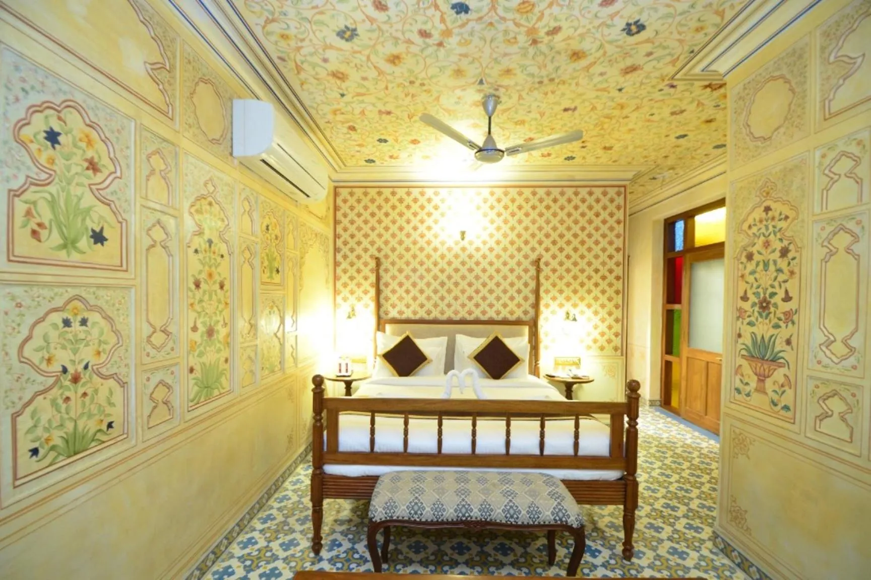 Bed in Nirbana Palace - A Heritage Hotel and Spa