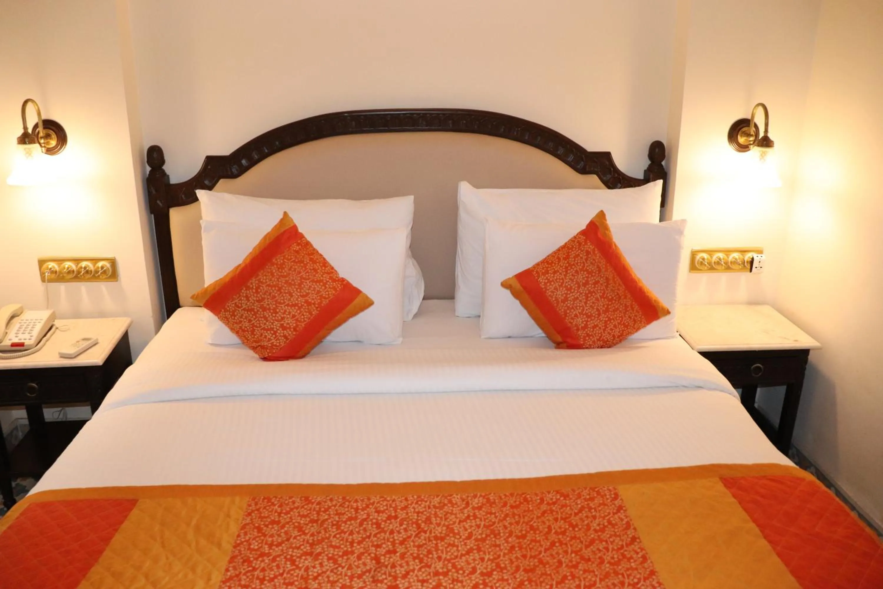 Bed in Nirbana Palace - A Heritage Hotel and Spa