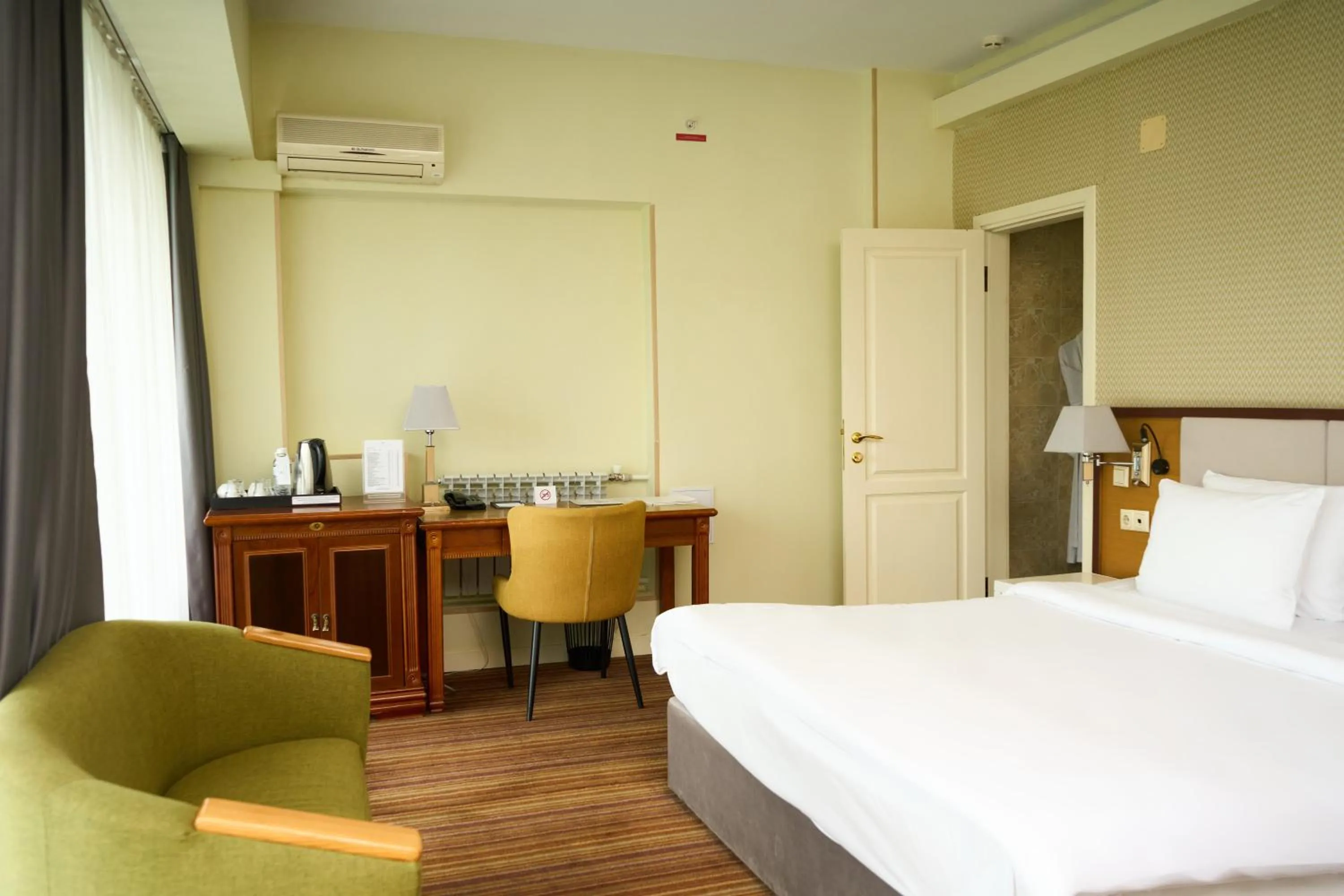 Photo of the whole room, Bed in Almaty Hotel