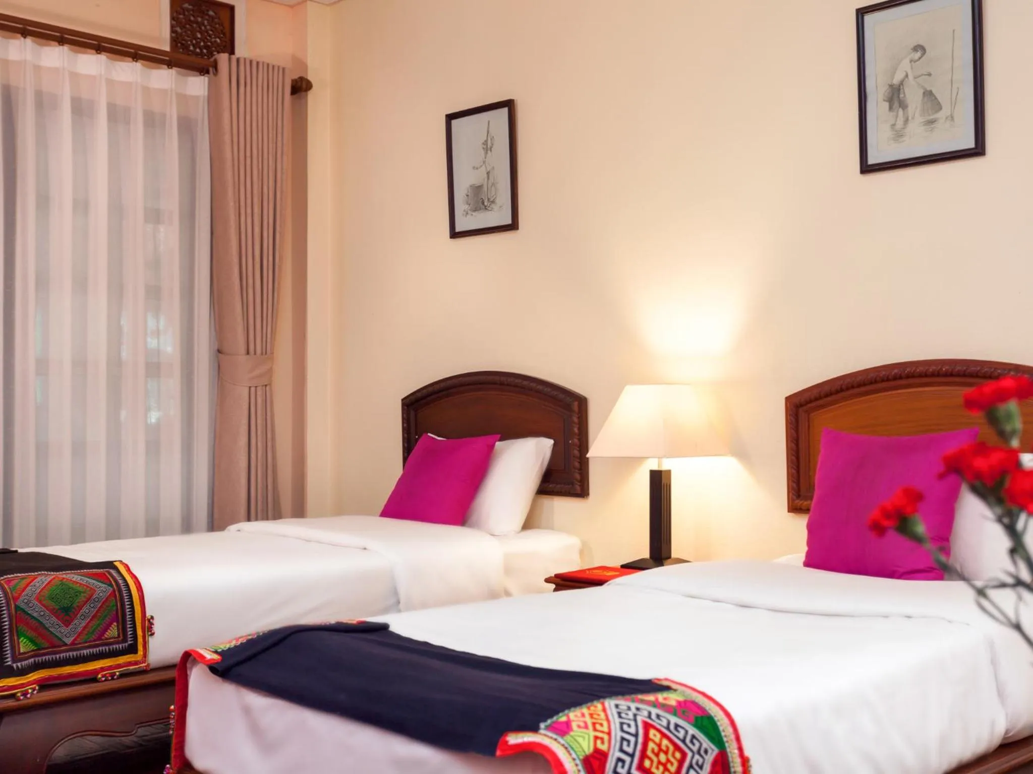 Bed in Chandara Boutique Hotel