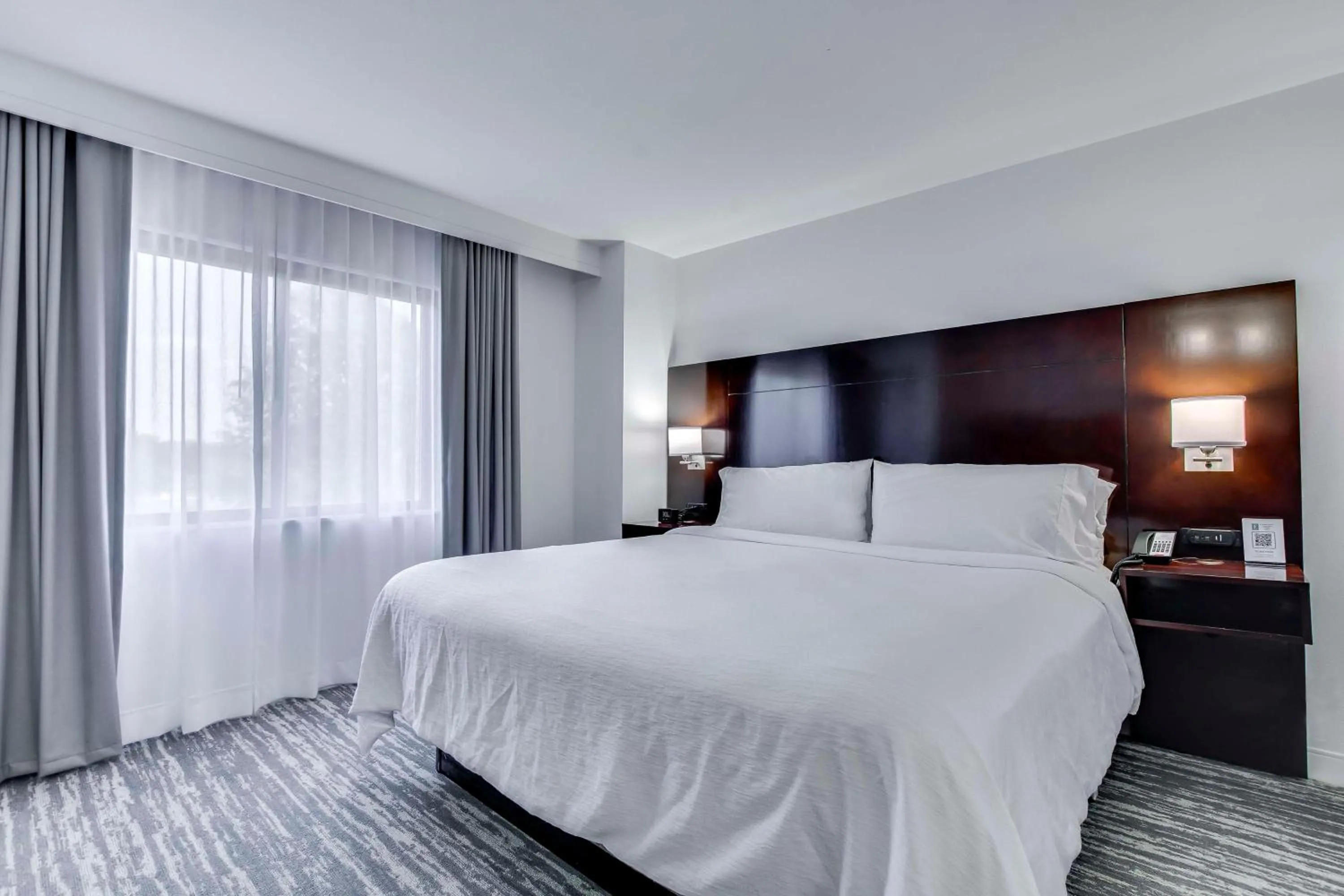 Bed in Embassy Suites by Hilton Louisville East