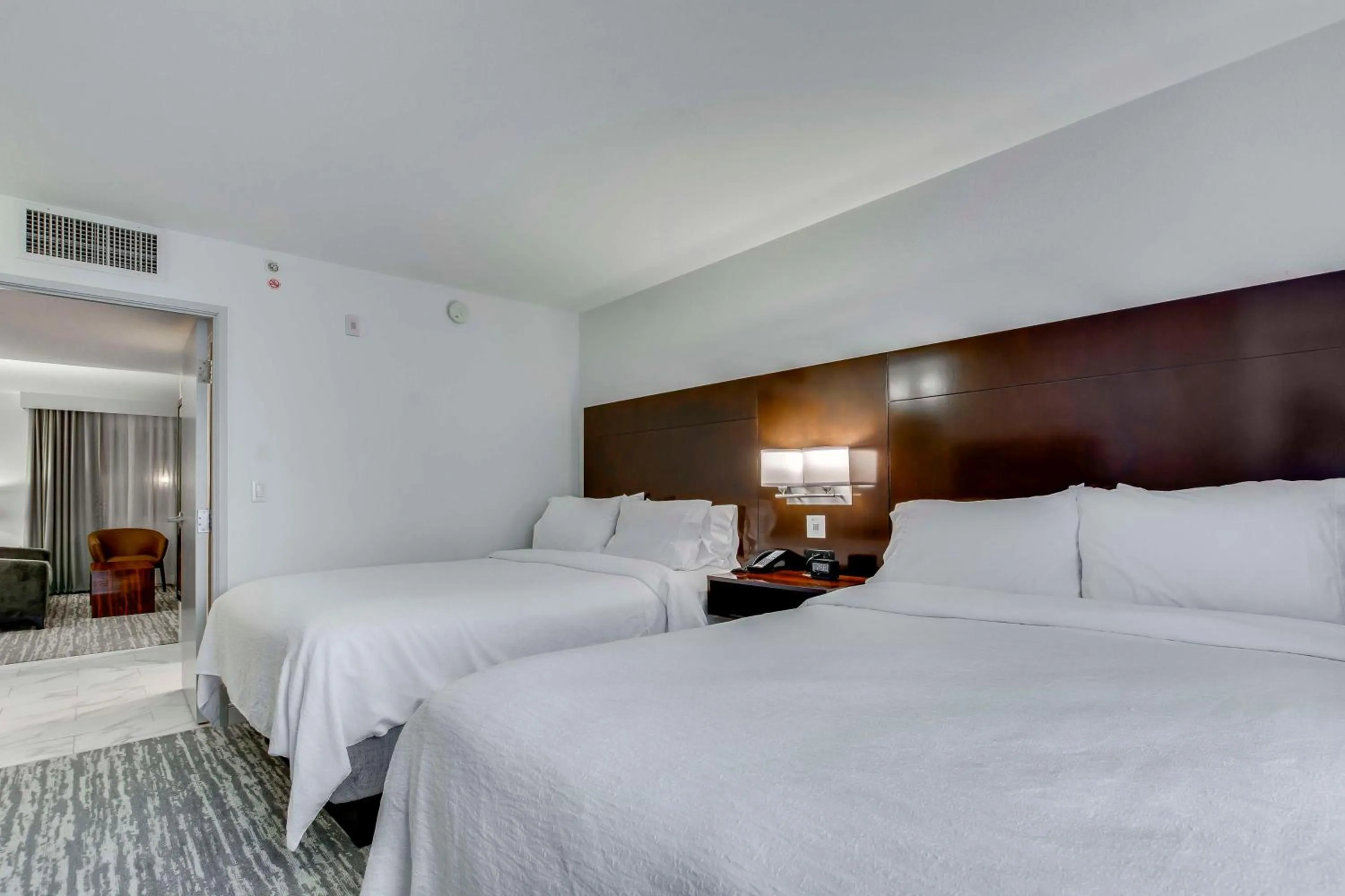 Bed in Embassy Suites by Hilton Louisville East