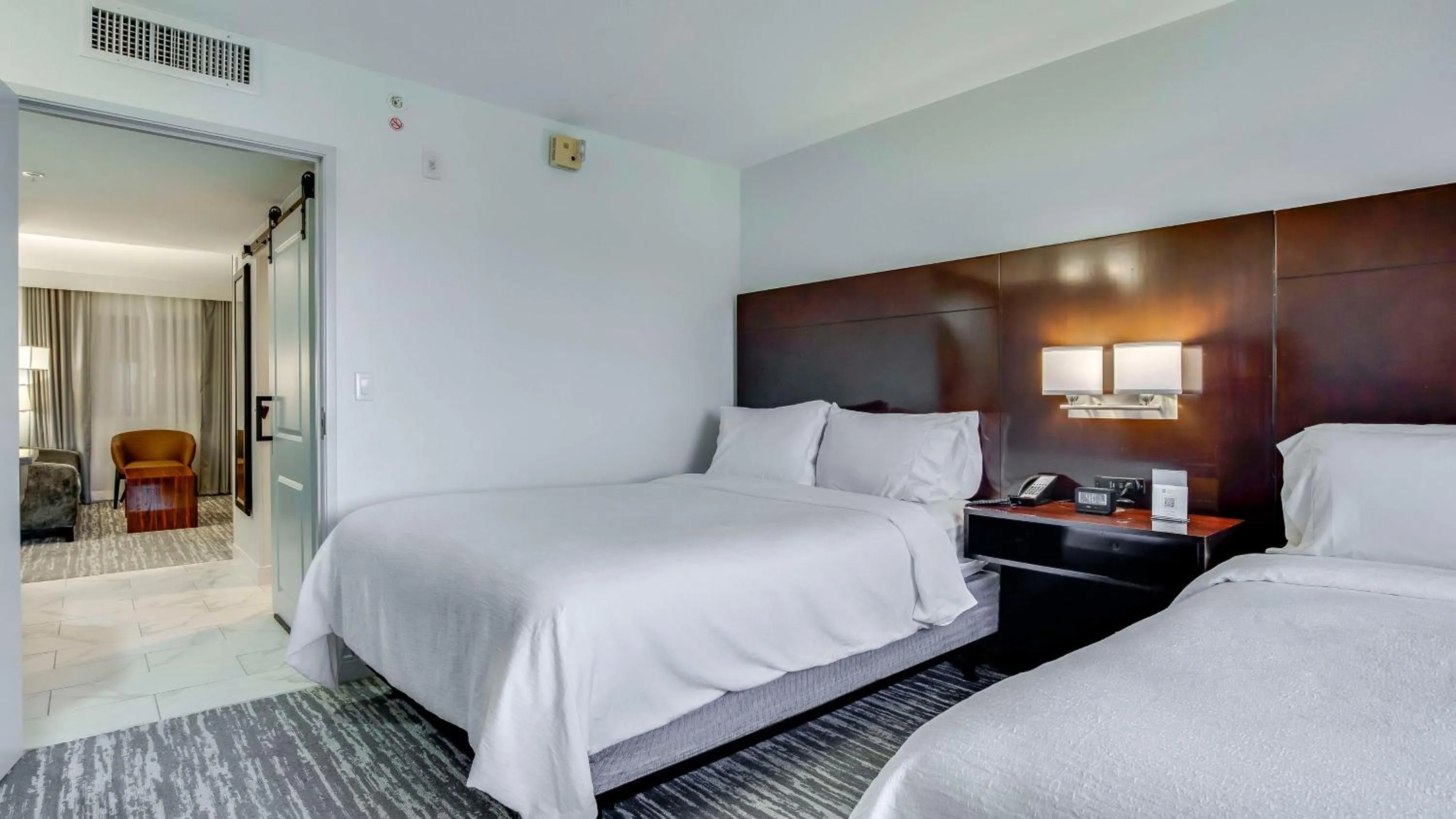 Bed in Embassy Suites by Hilton Louisville East