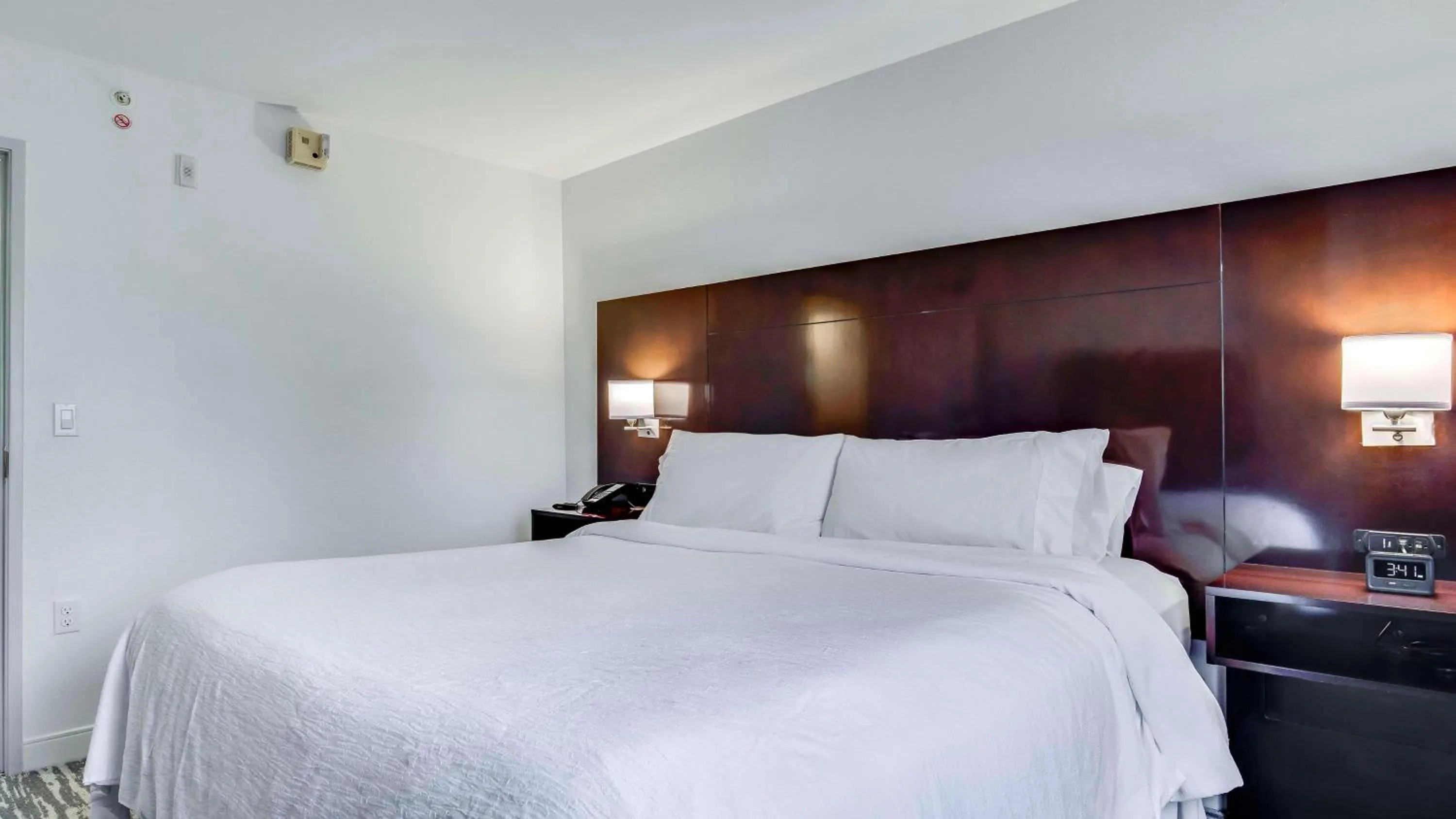 Bed in Embassy Suites by Hilton Louisville East