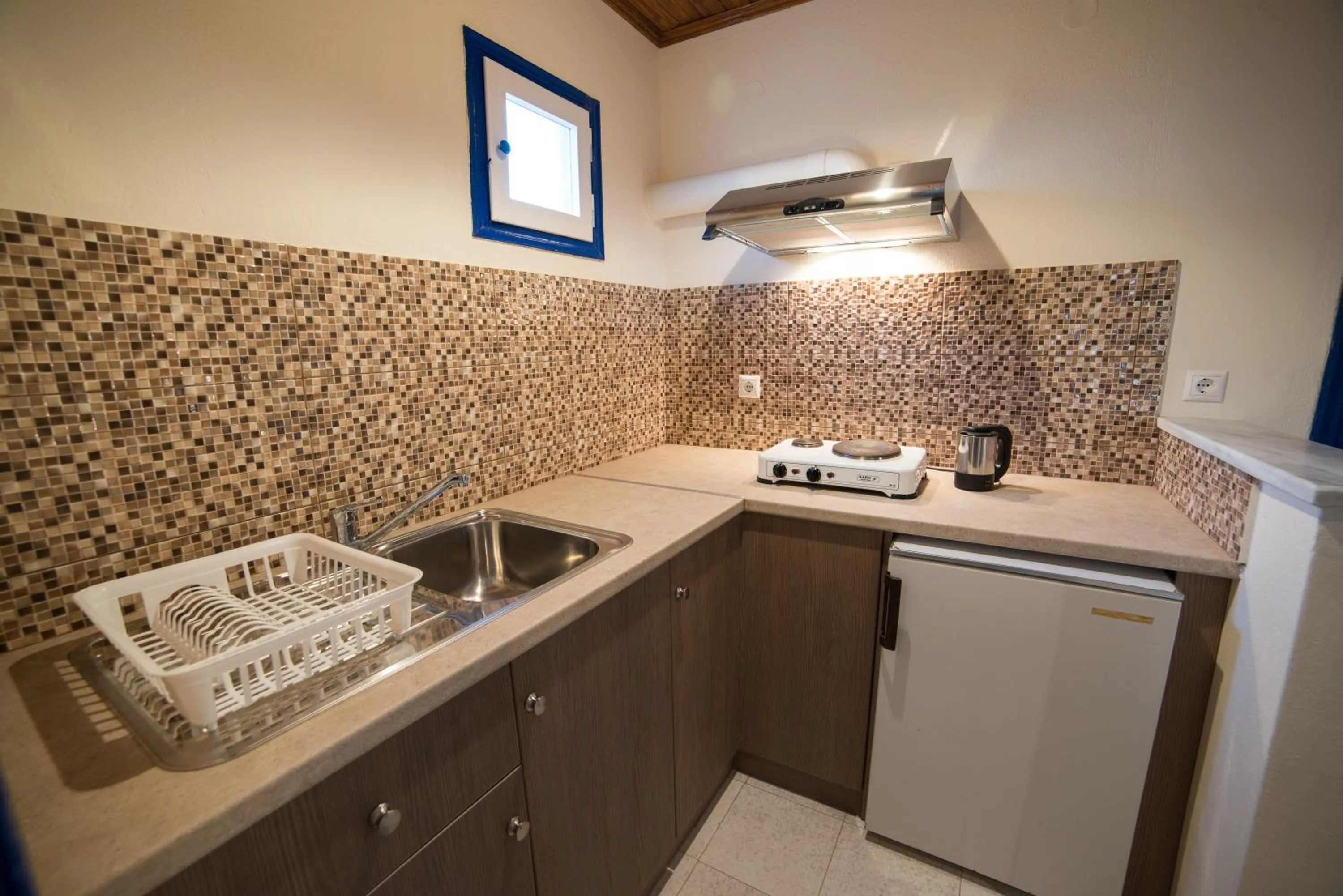 Kitchen or kitchenette in Sunset Hotel