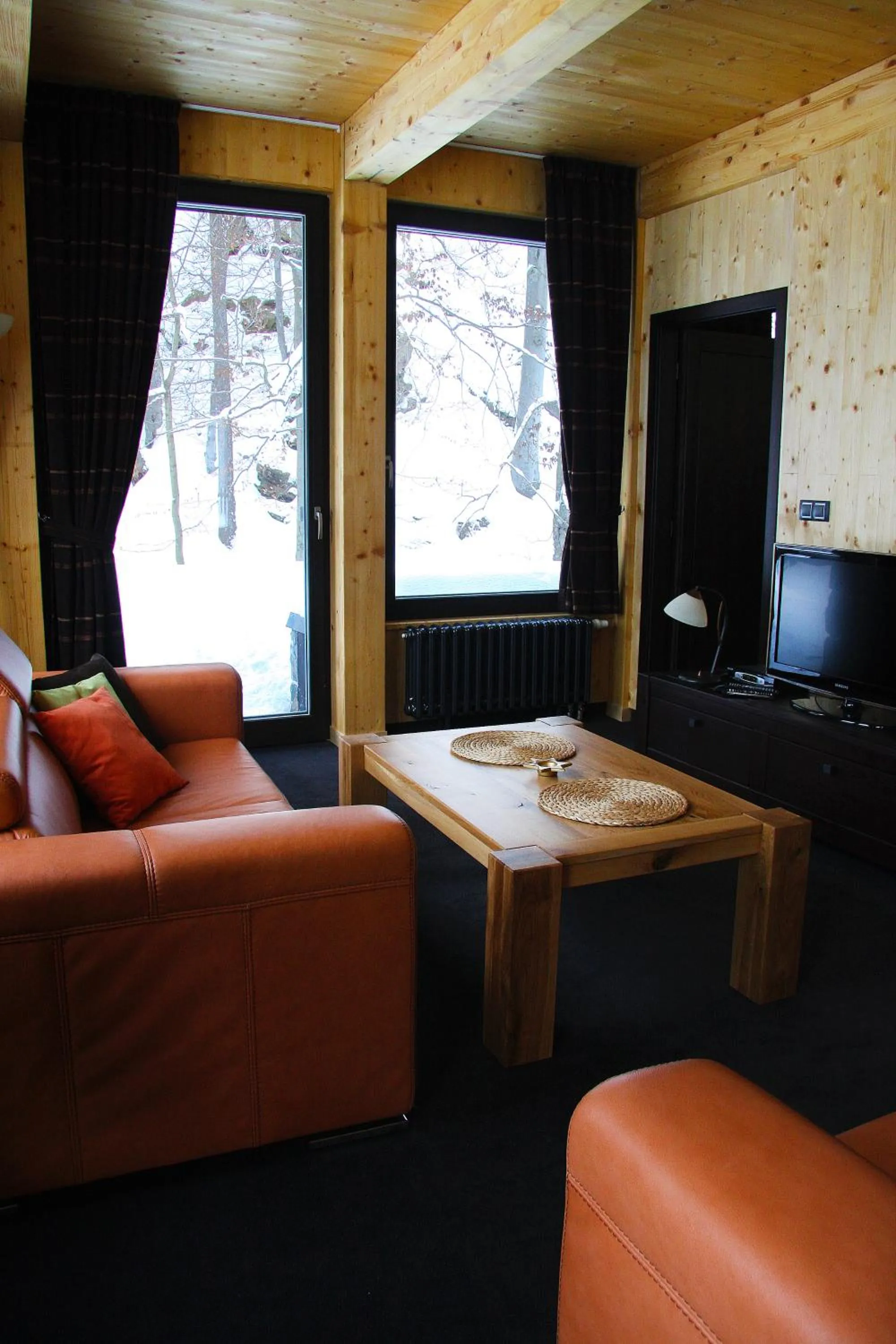 Living room in Krakonošova Dílna "WOODHAUS"