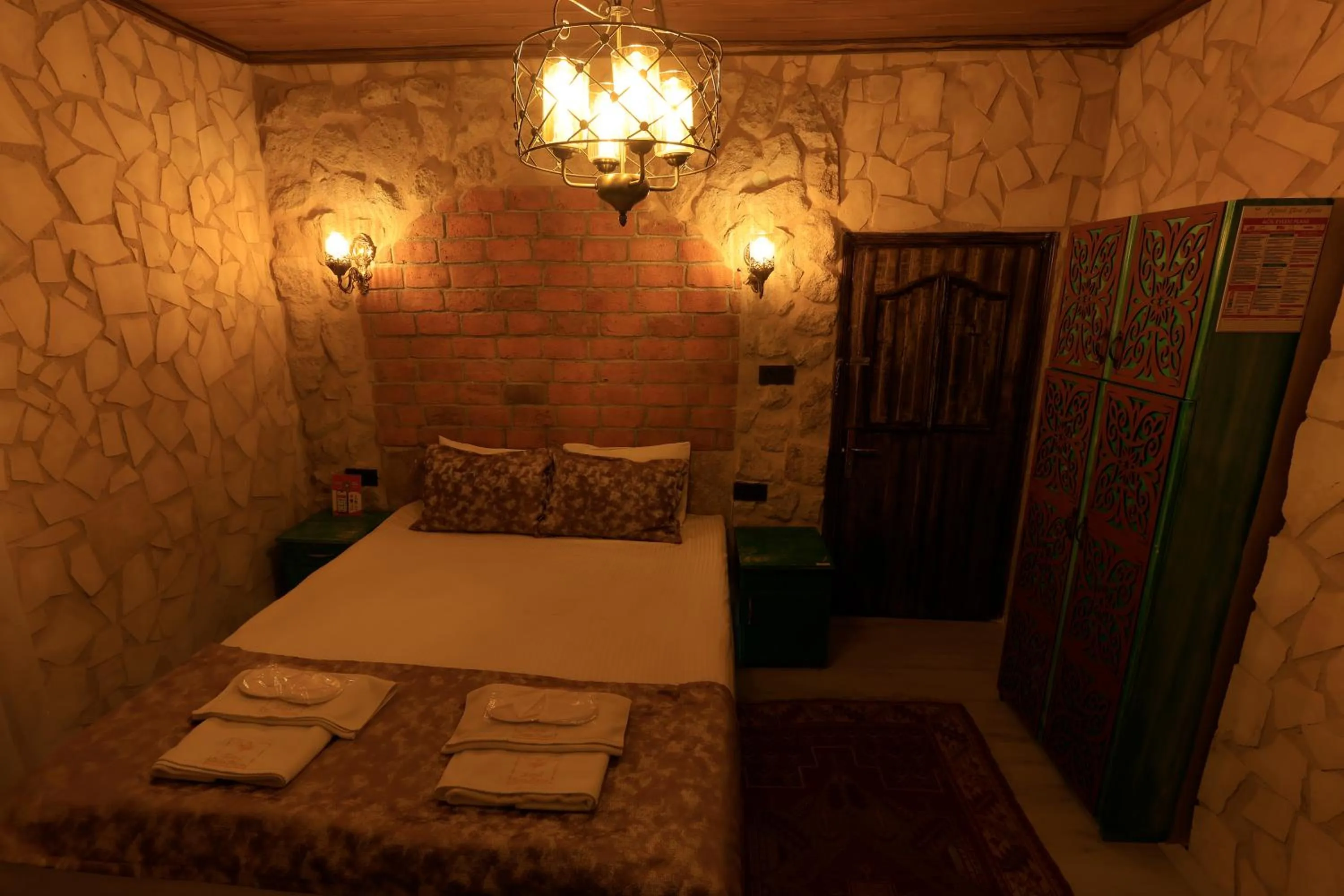 Bed in KEMAL STONE HOUSE HOTEL.
