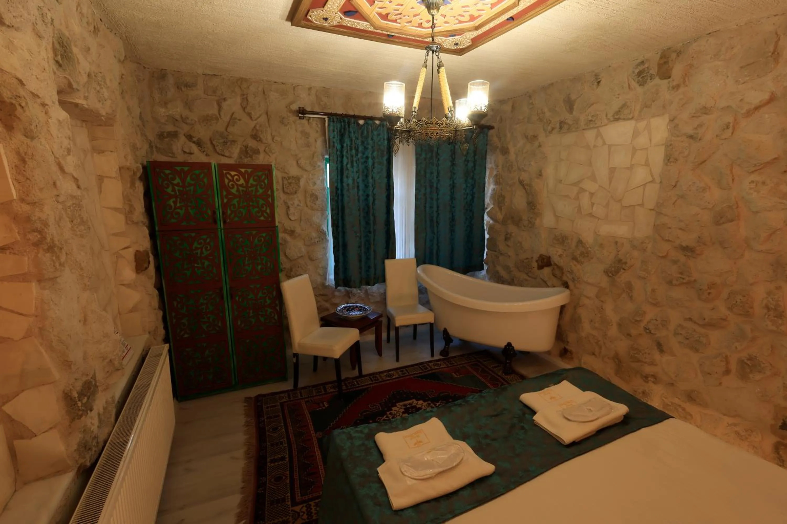 Bed in KEMAL STONE HOUSE HOTEL.