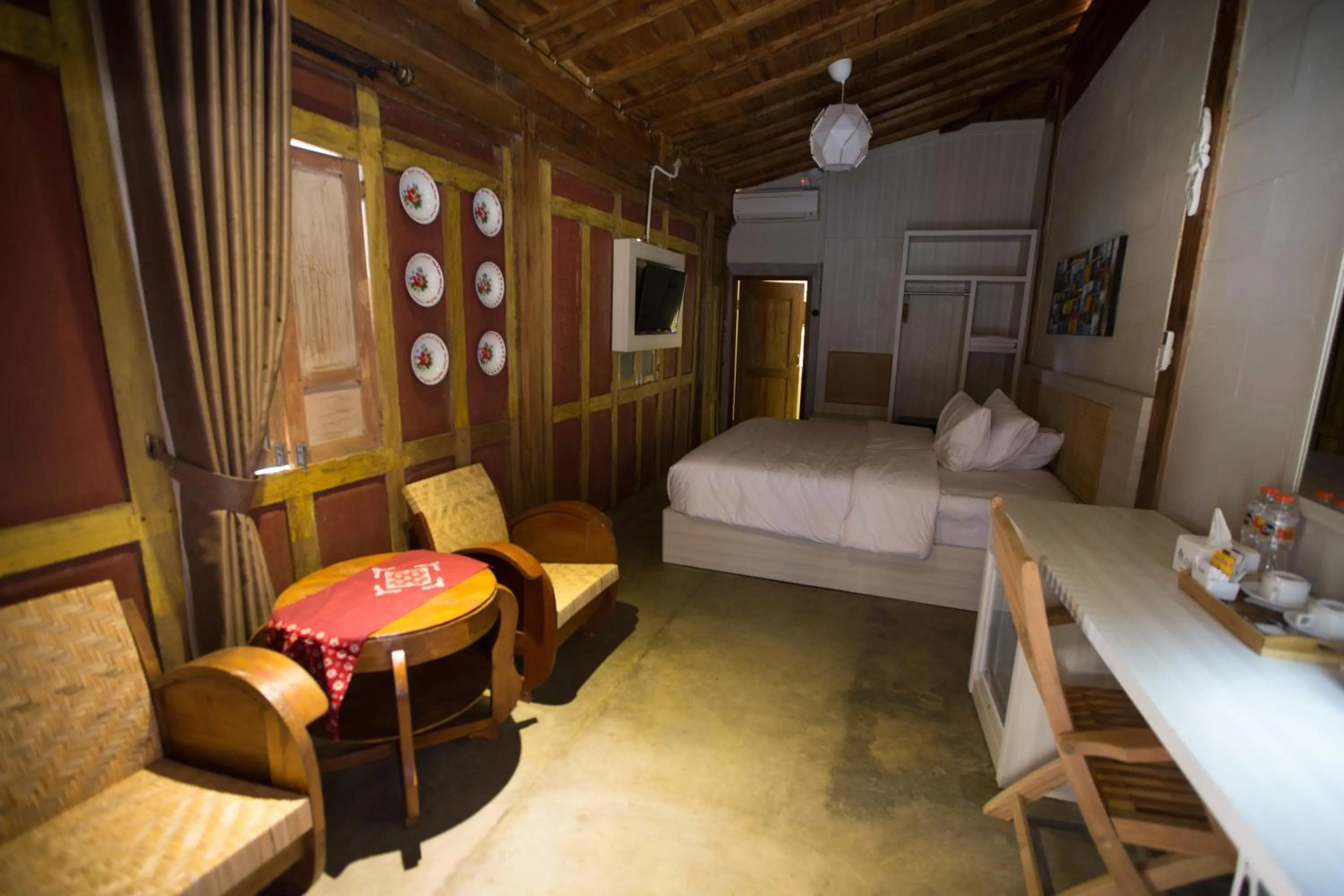 Photo of the whole room, Bed in Kampung Lawasan Heritage Cottage
