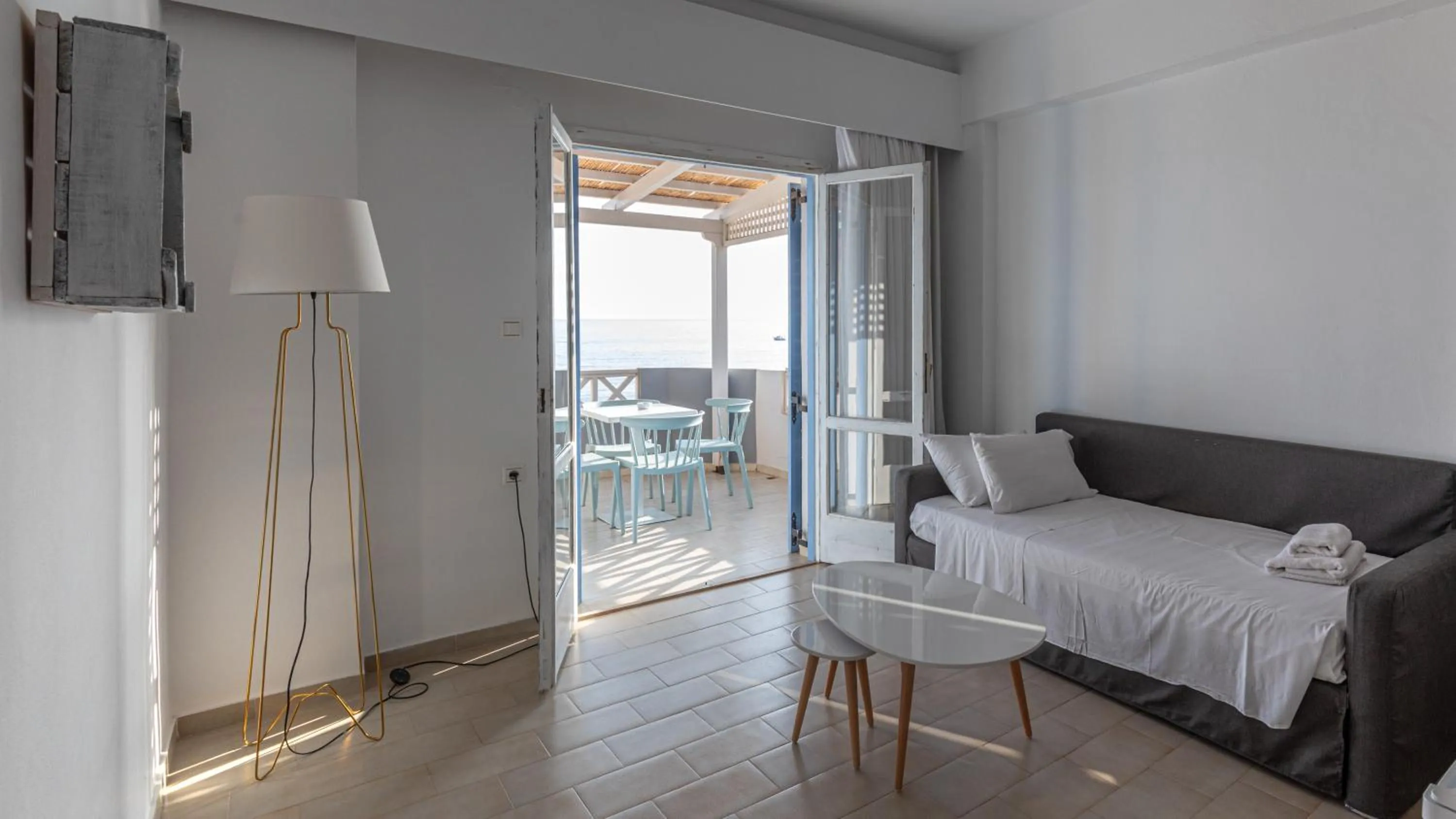 Living room, Bed in Triton Authentic Cretan Hotel