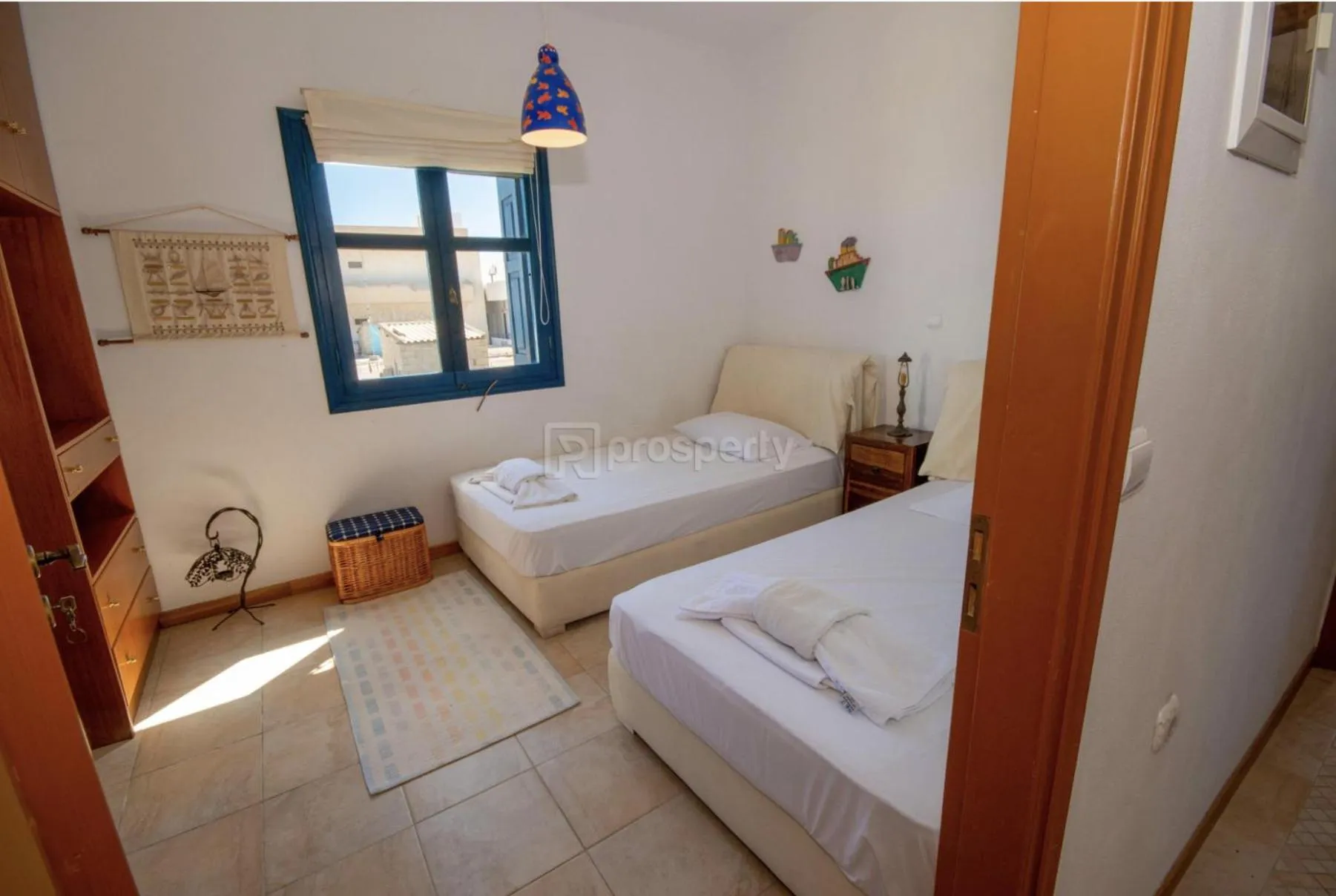 Bed in Triton Authentic Cretan Hotel