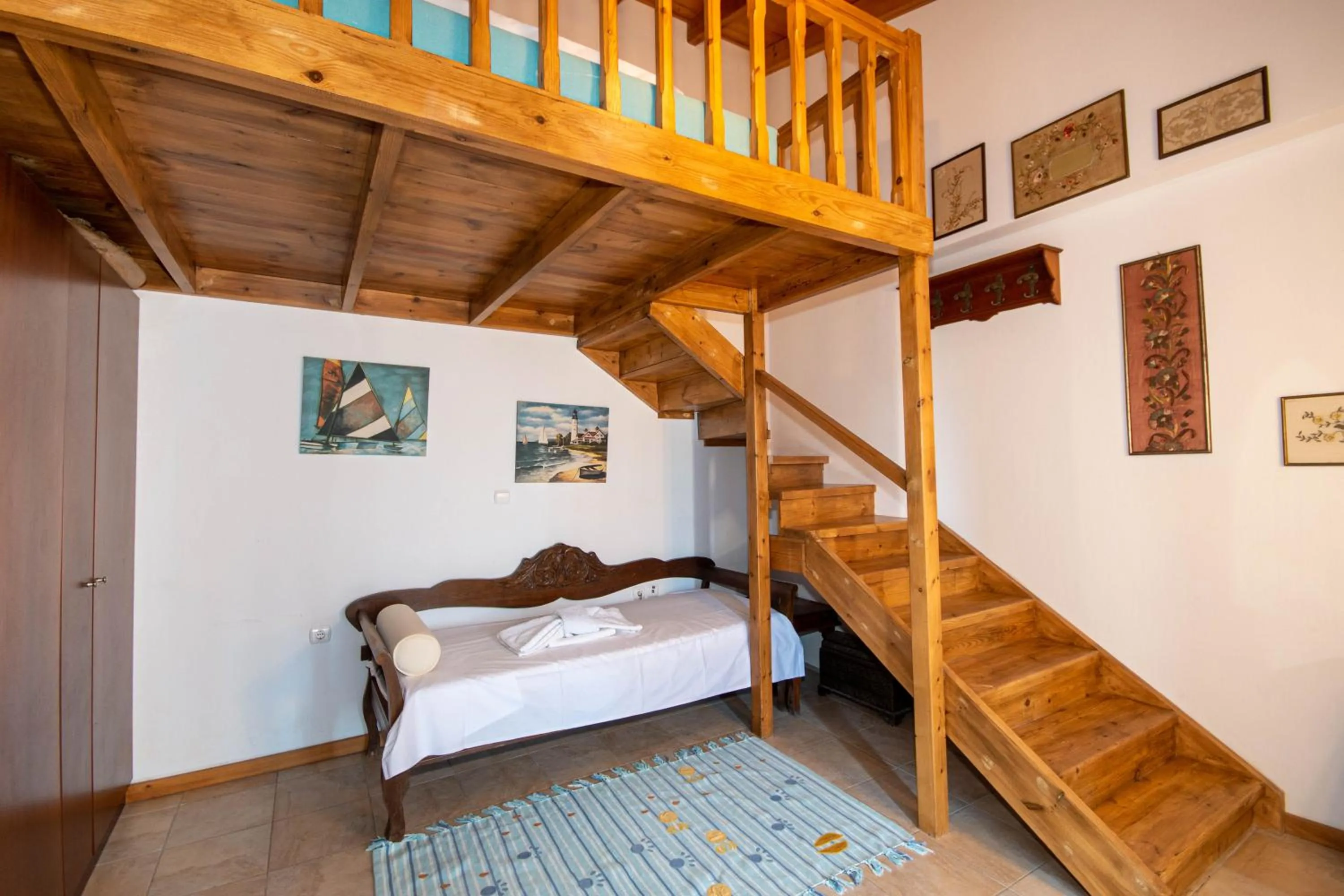 Bed in Triton Authentic Cretan Hotel