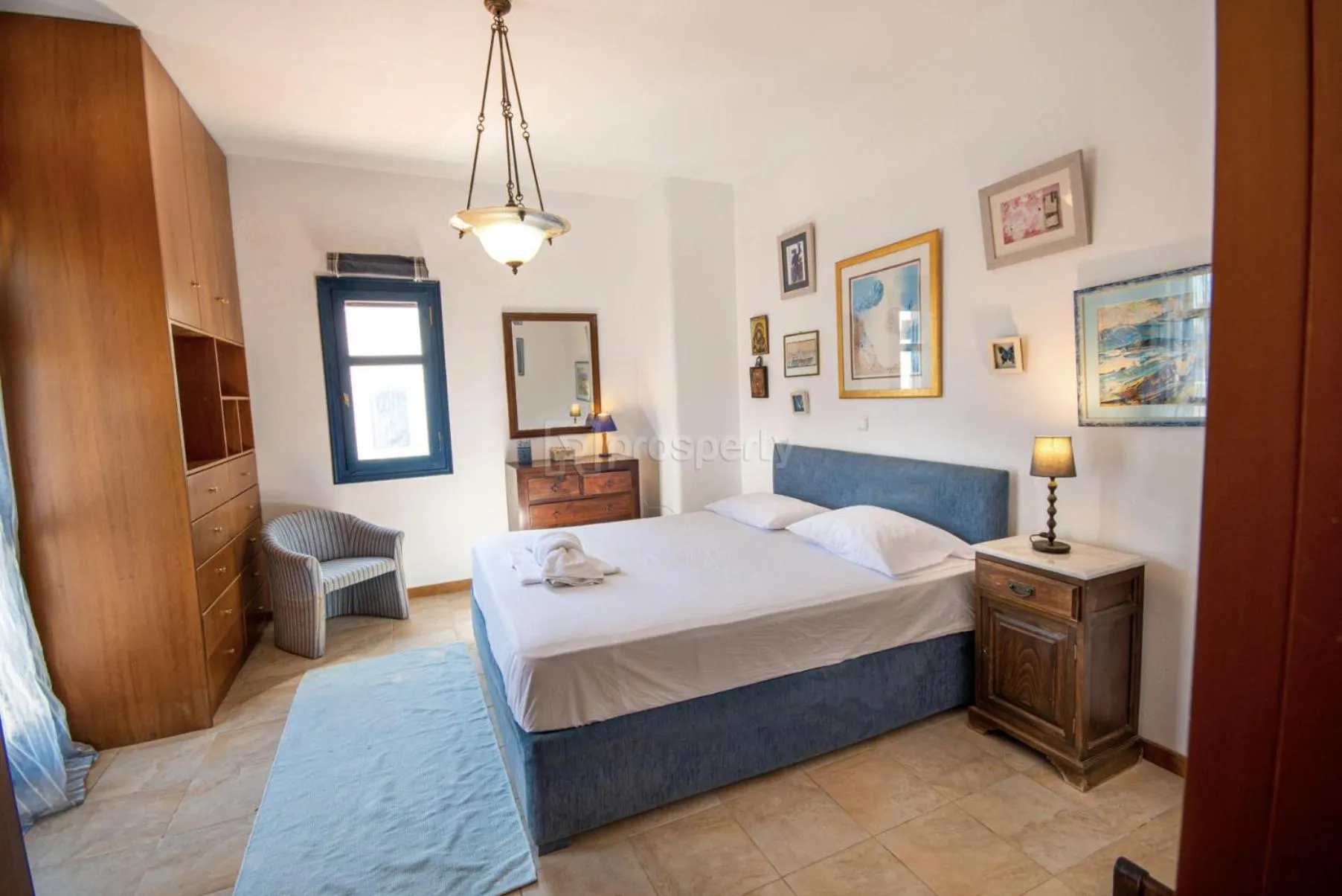 Bed in Triton Authentic Cretan Hotel