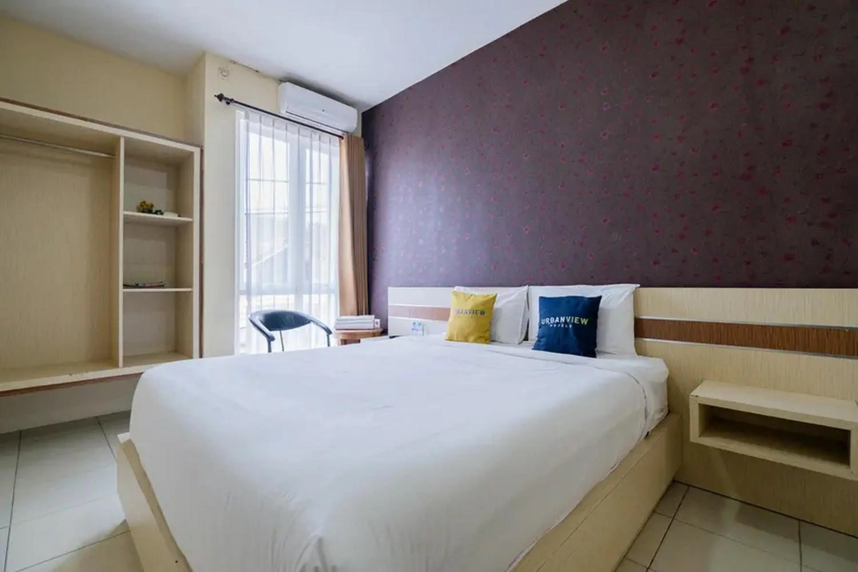 Bed in Urbanview Hotel Omah Anin Batu by RedDoorz