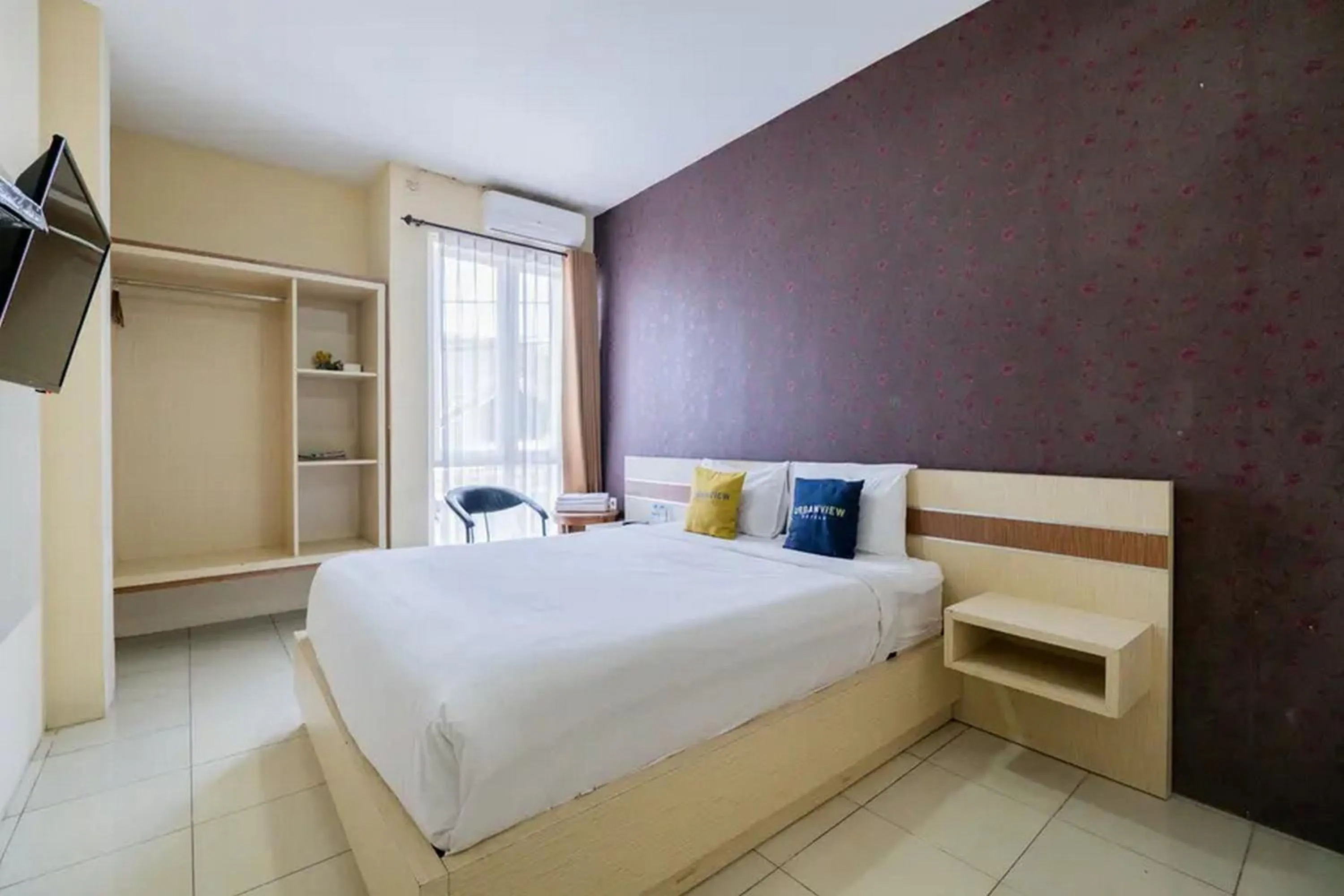 Bed in Urbanview Hotel Omah Anin Batu by RedDoorz