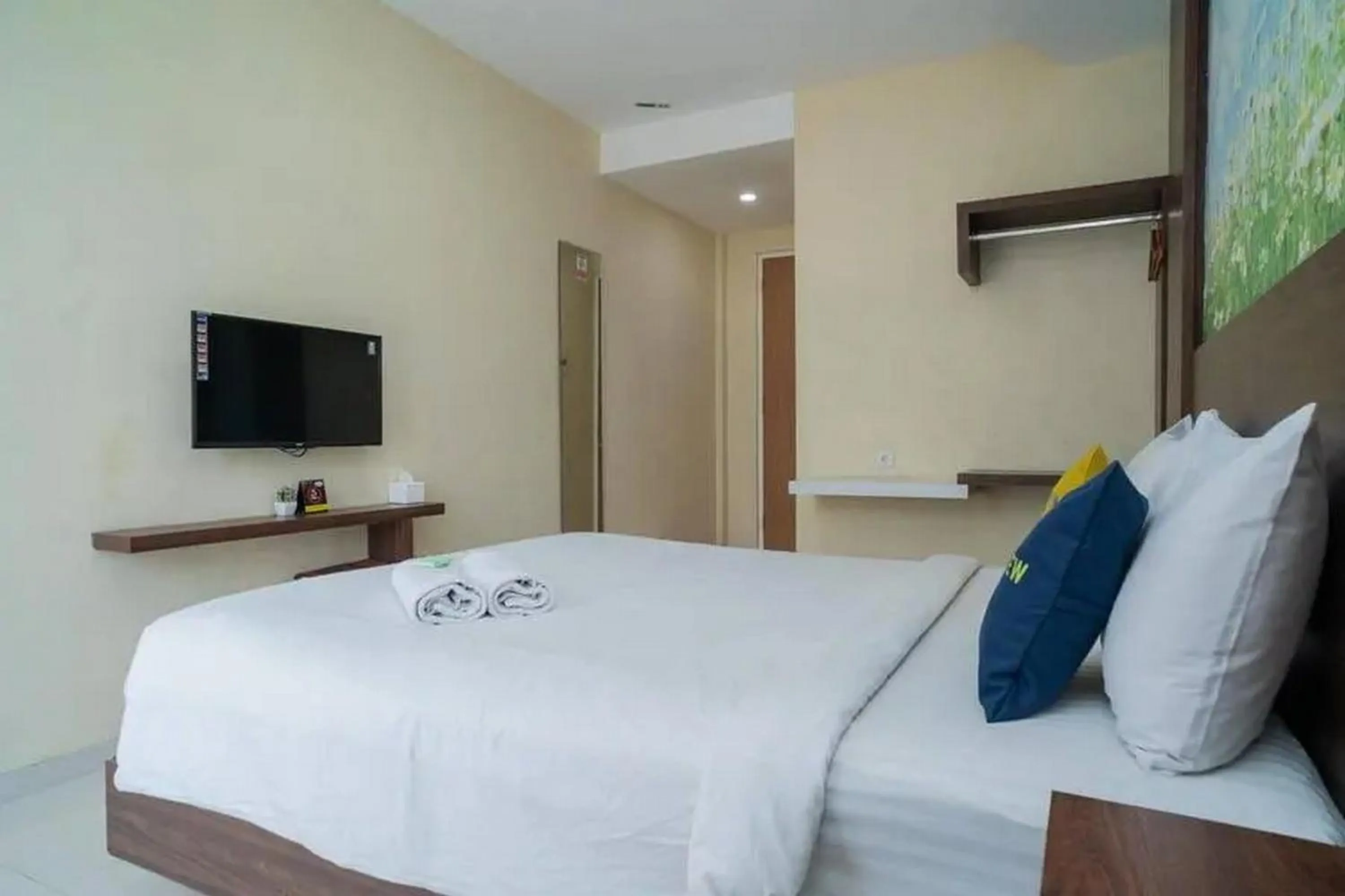 Bed in Urbanview Hotel Omah Anin Batu by RedDoorz