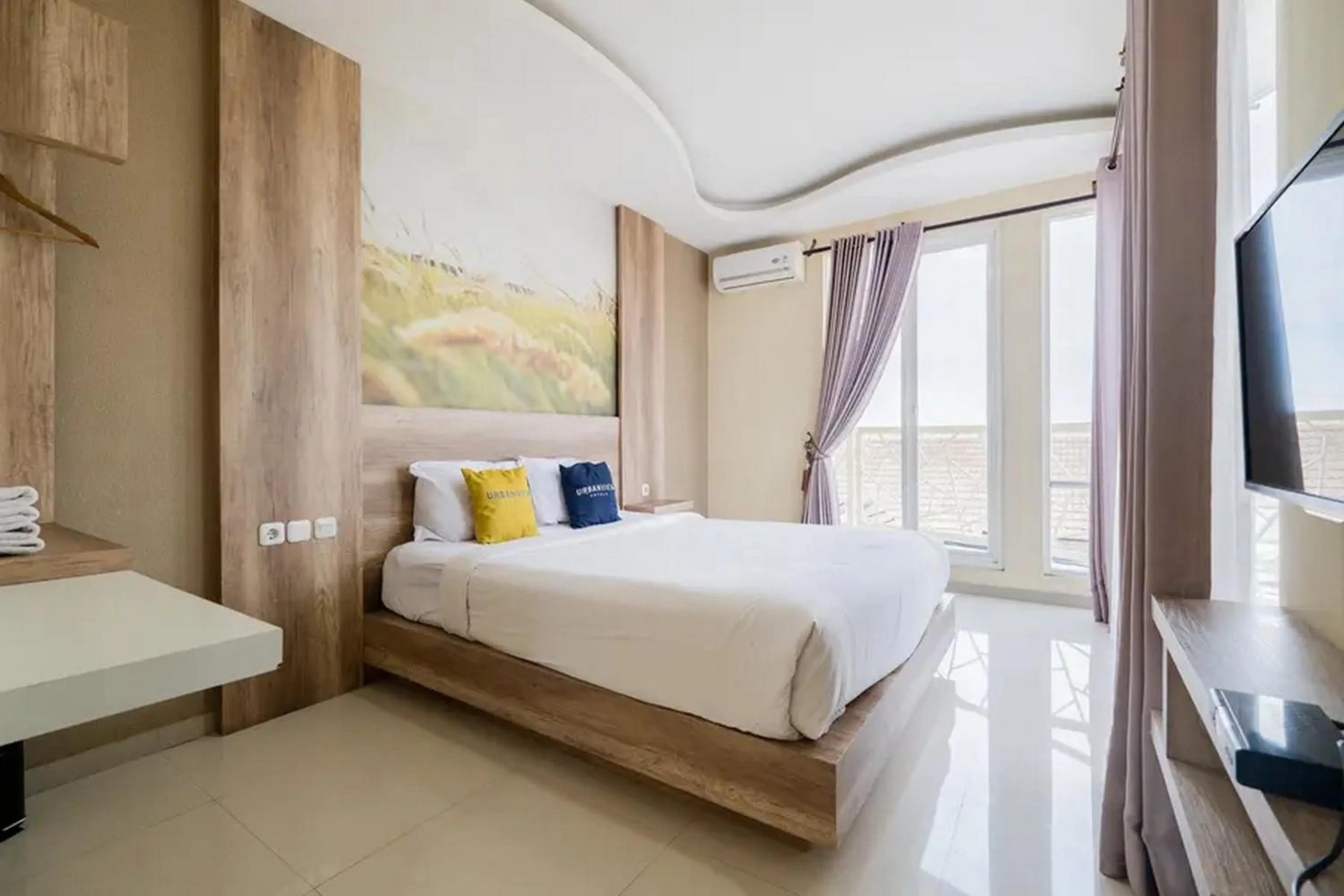 Bed in Urbanview Hotel Omah Anin Batu by RedDoorz