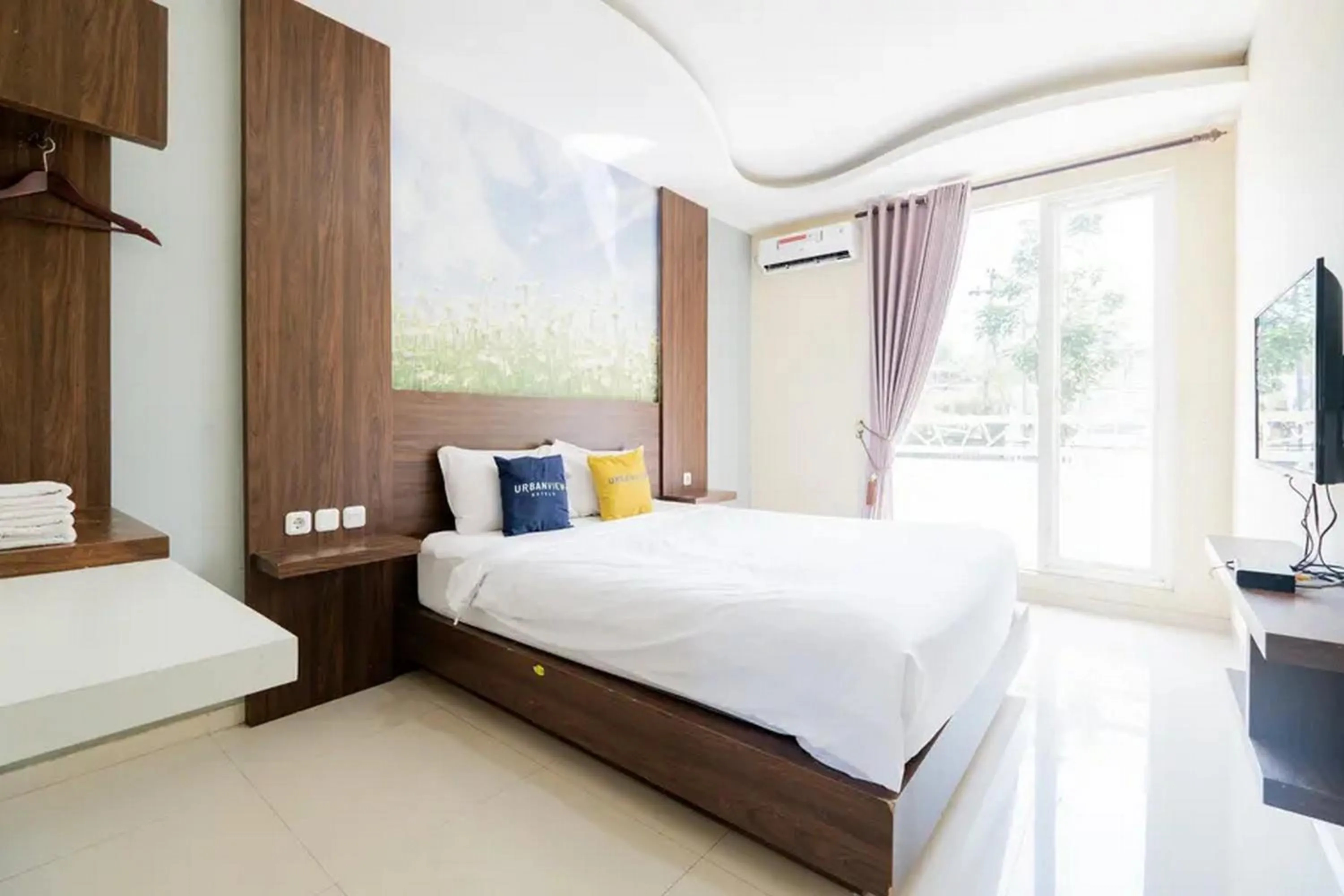 Bed in Urbanview Hotel Omah Anin Batu by RedDoorz