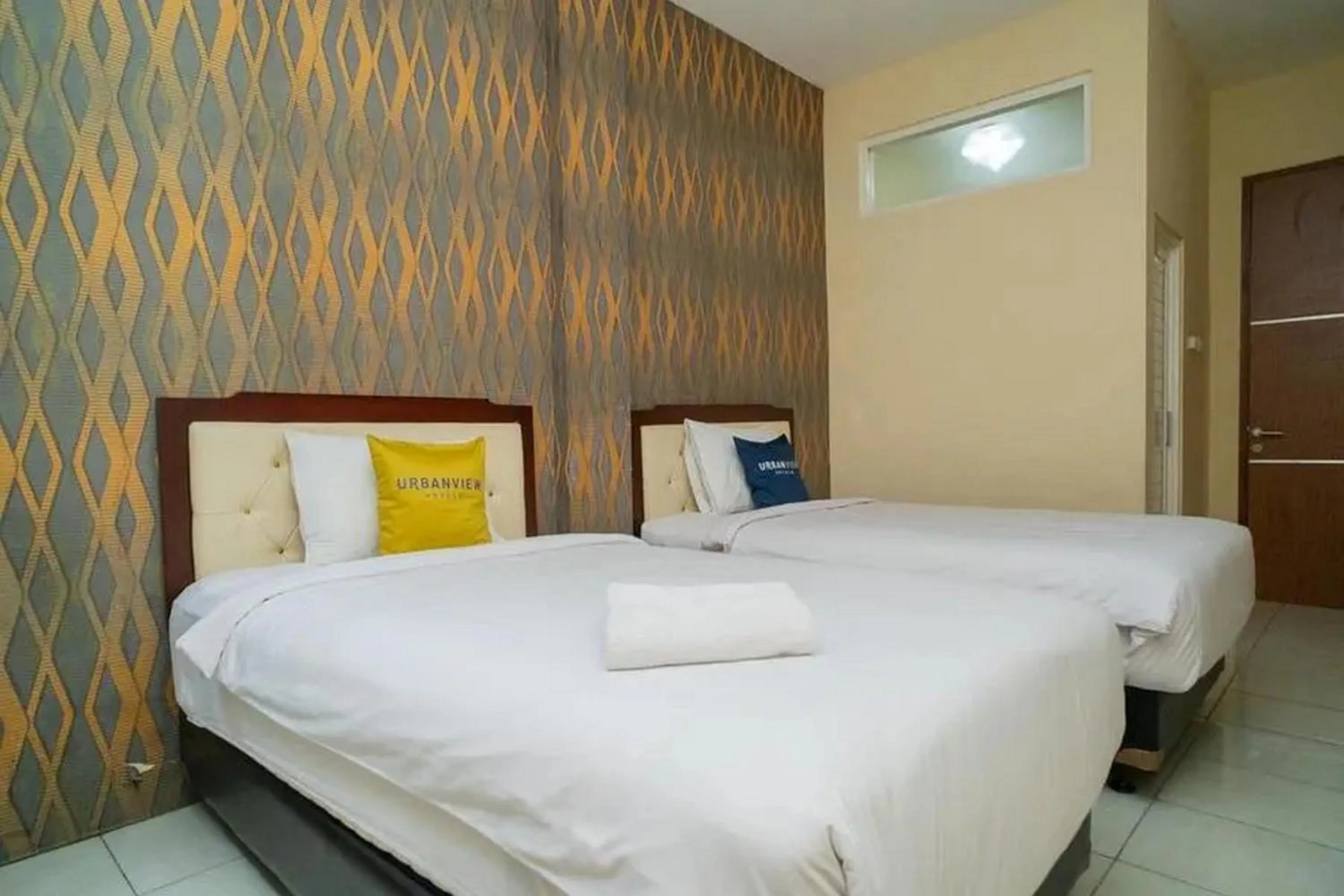 Bed in Urbanview Hotel Omah Anin Batu by RedDoorz