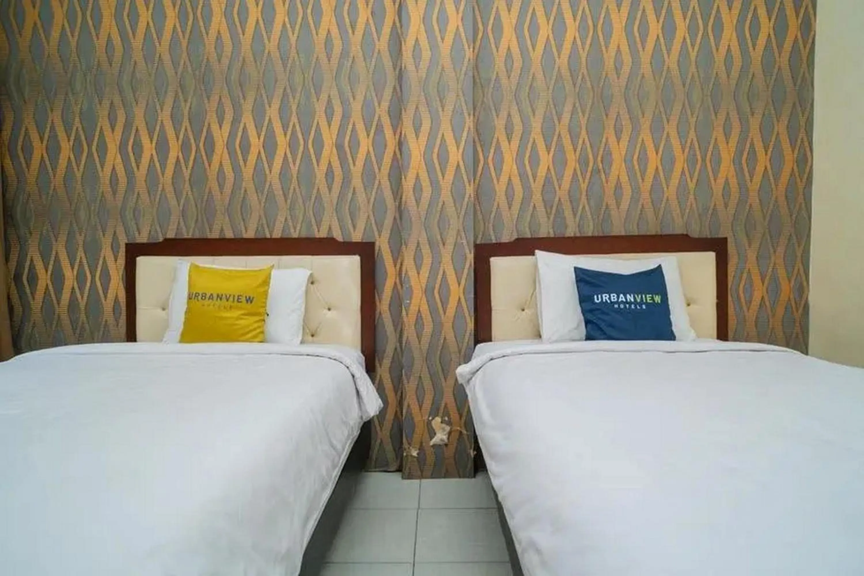 Bed in Urbanview Hotel Omah Anin Batu by RedDoorz