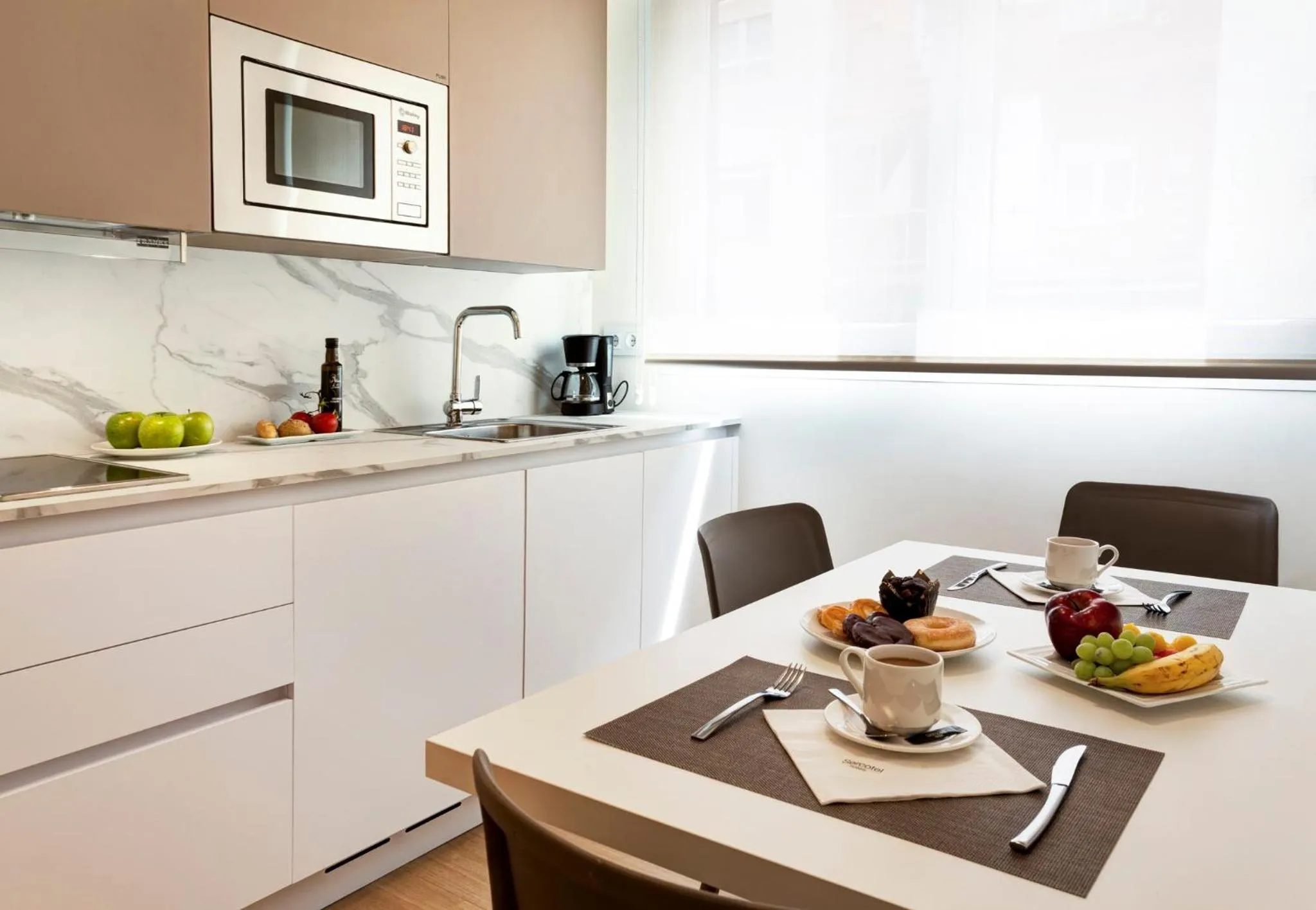 Kitchen or kitchenette in Sercotel Logroño Suites