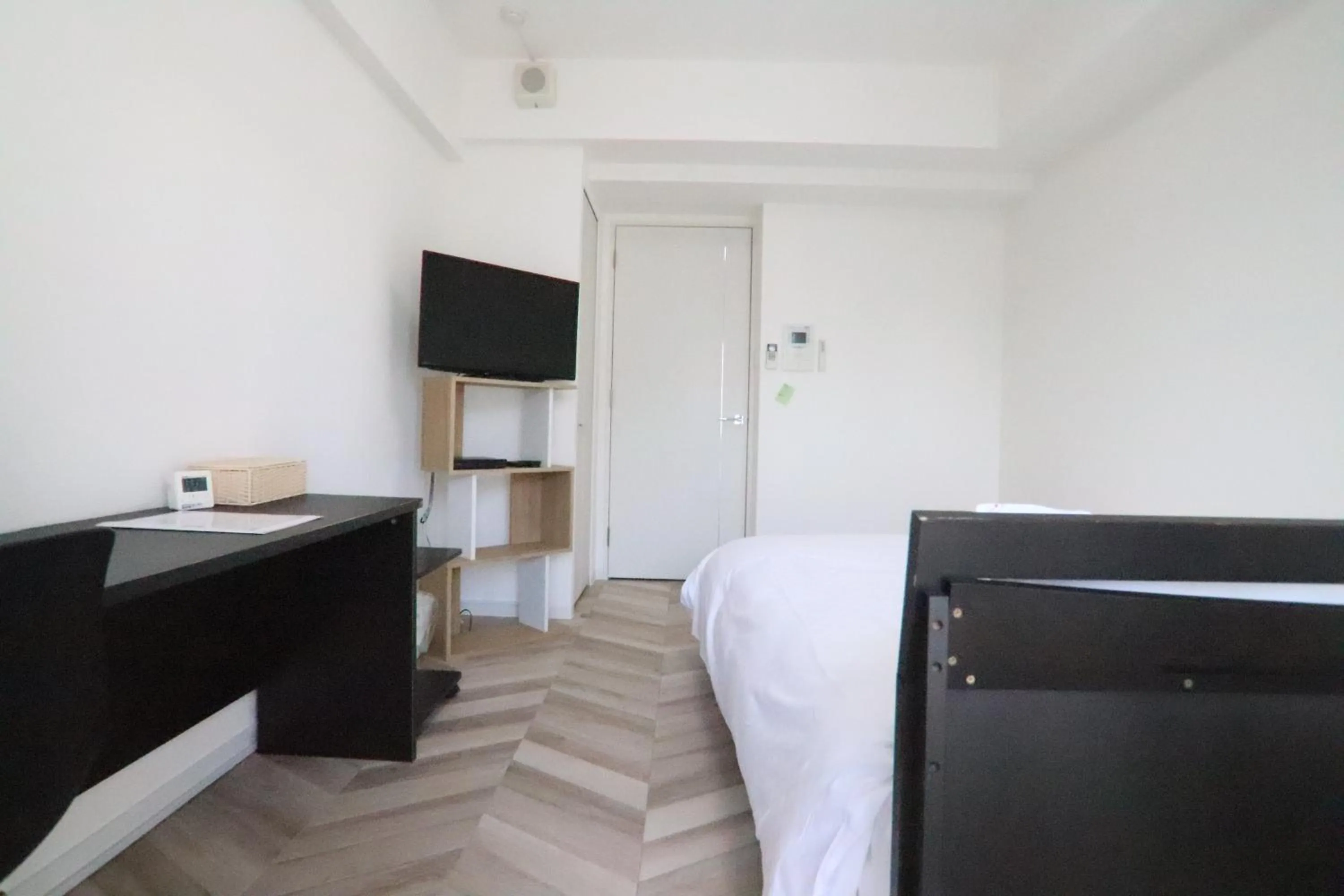 Photo of the whole room, Bed in PG Kuromon