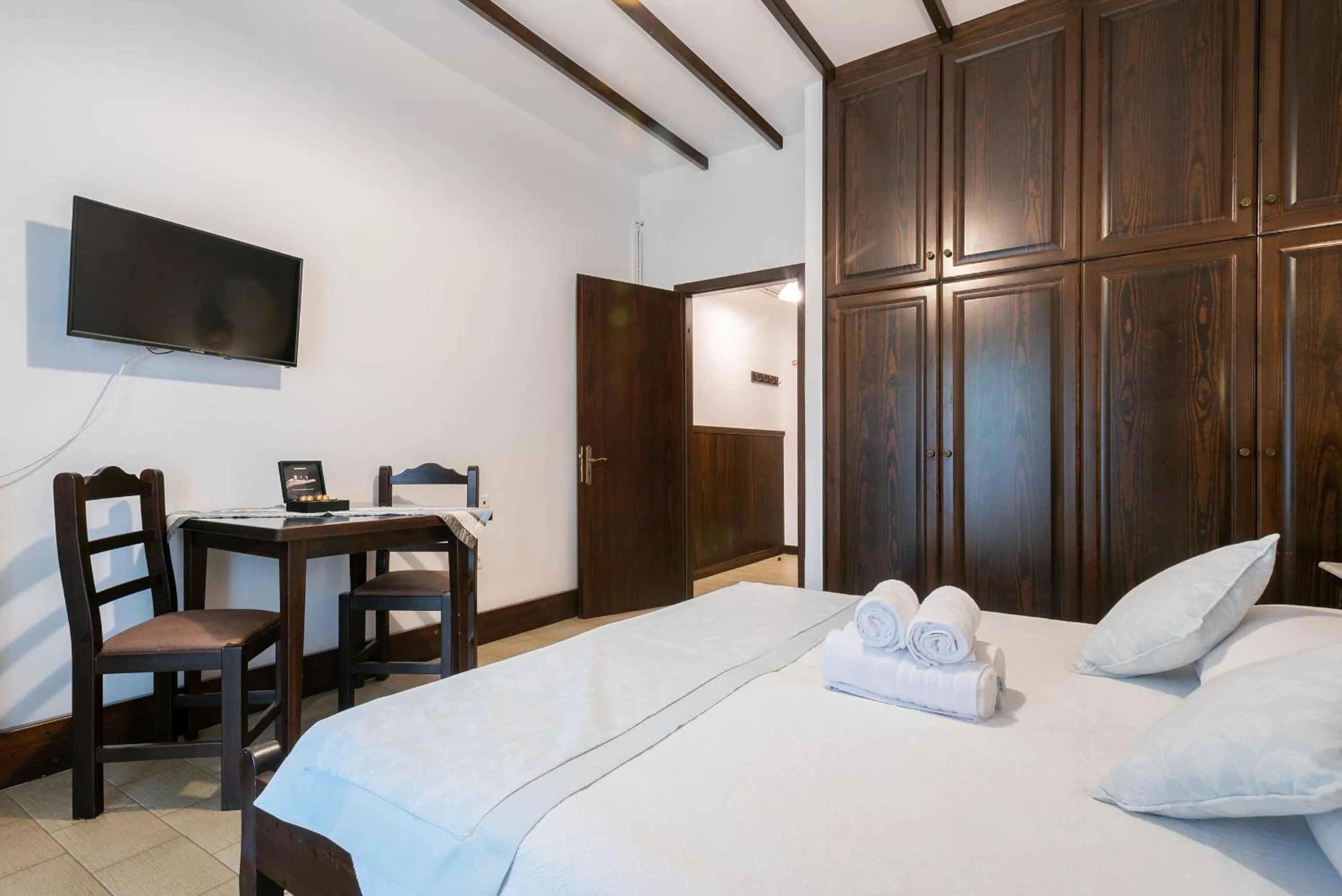 Bed in Afrodite Hotel Apartments