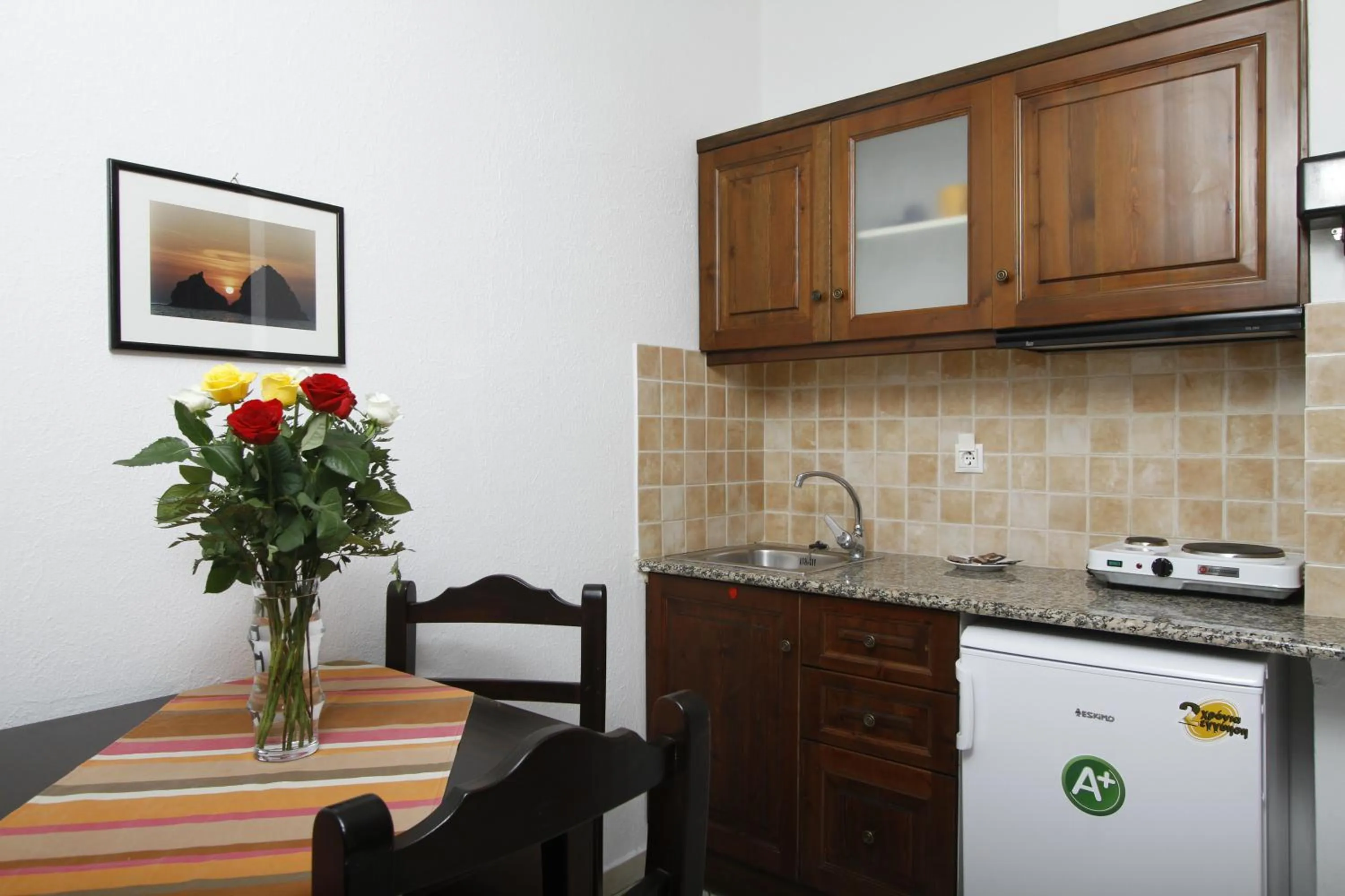 Kitchen or kitchenette in Afrodite Hotel Apartments