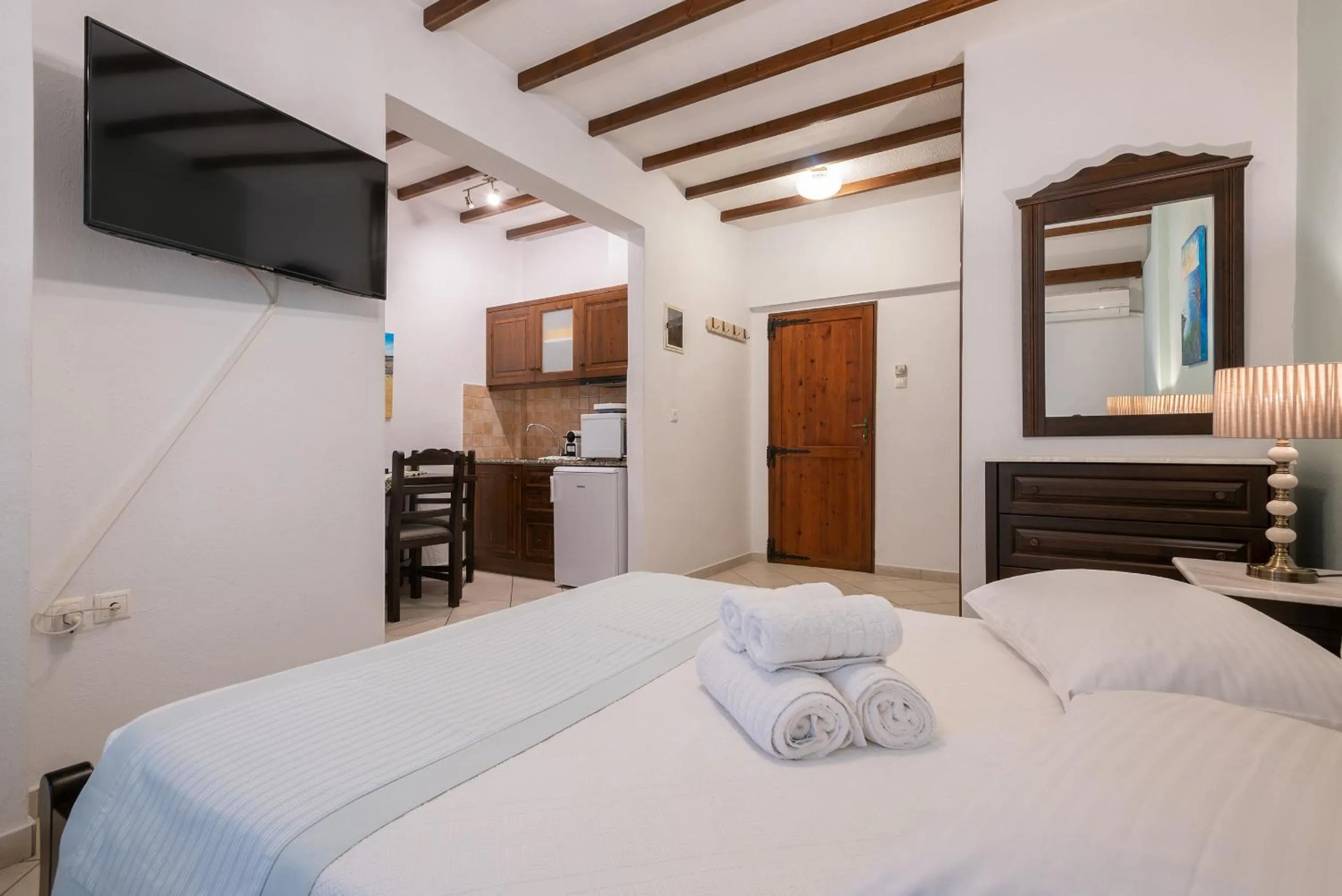 Bed in Afrodite Hotel Apartments