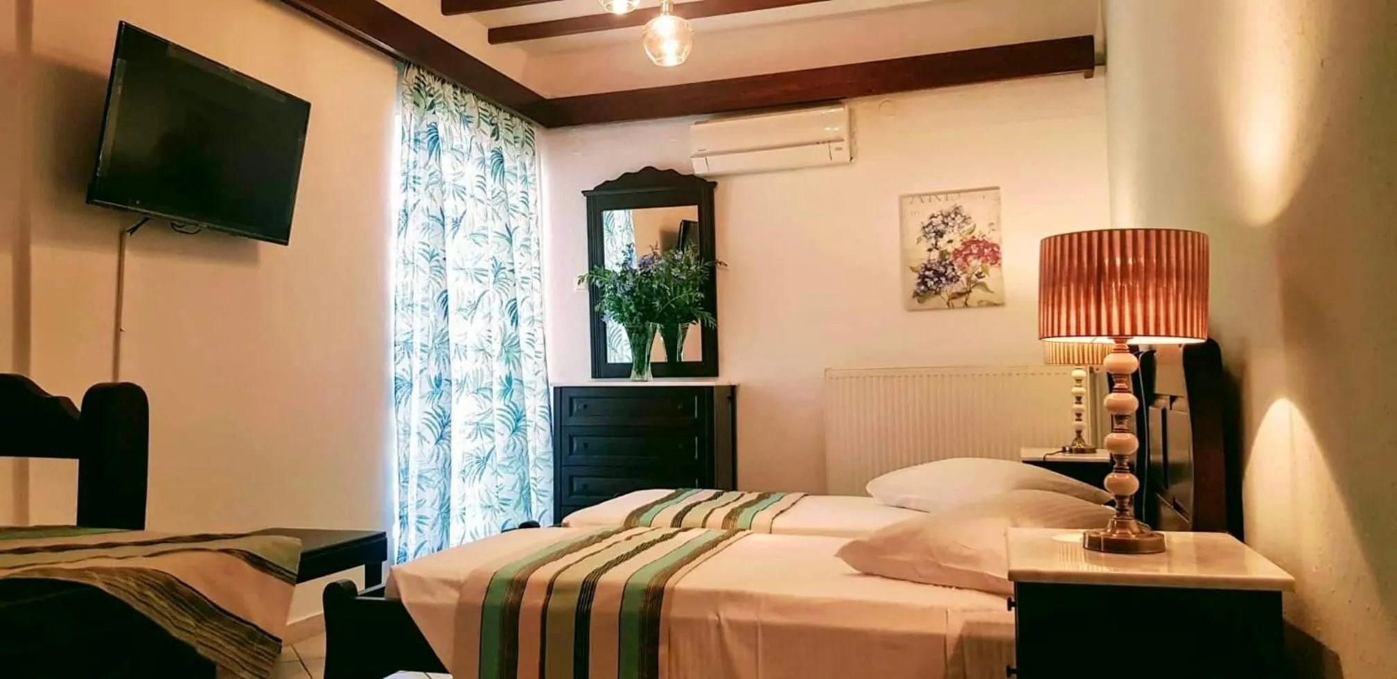 Bed in Afrodite Hotel Apartments