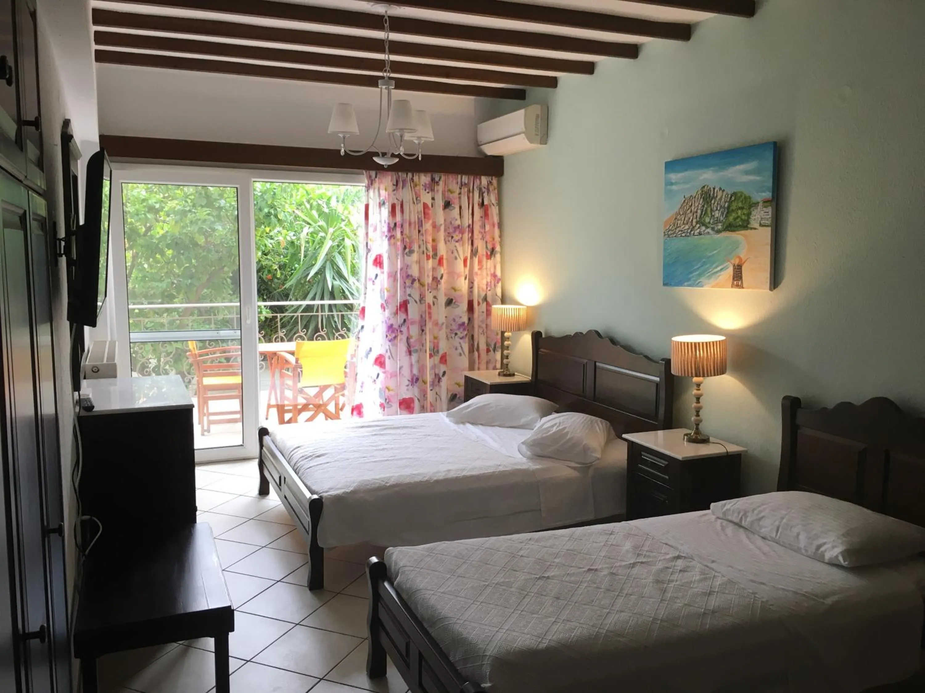 Bed in Afrodite Hotel Apartments