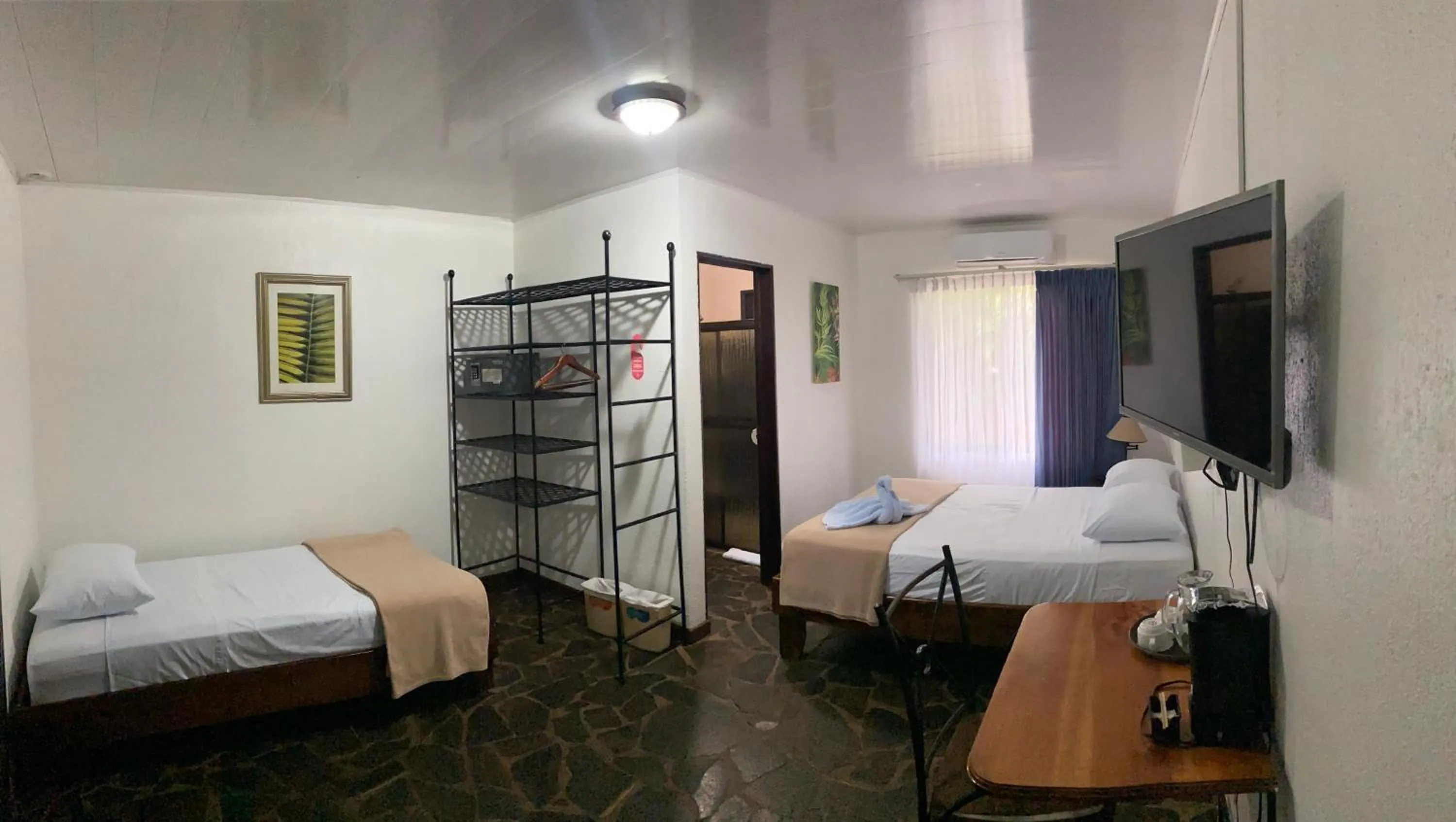 Bed in Tirimbina Rainforest Lodge