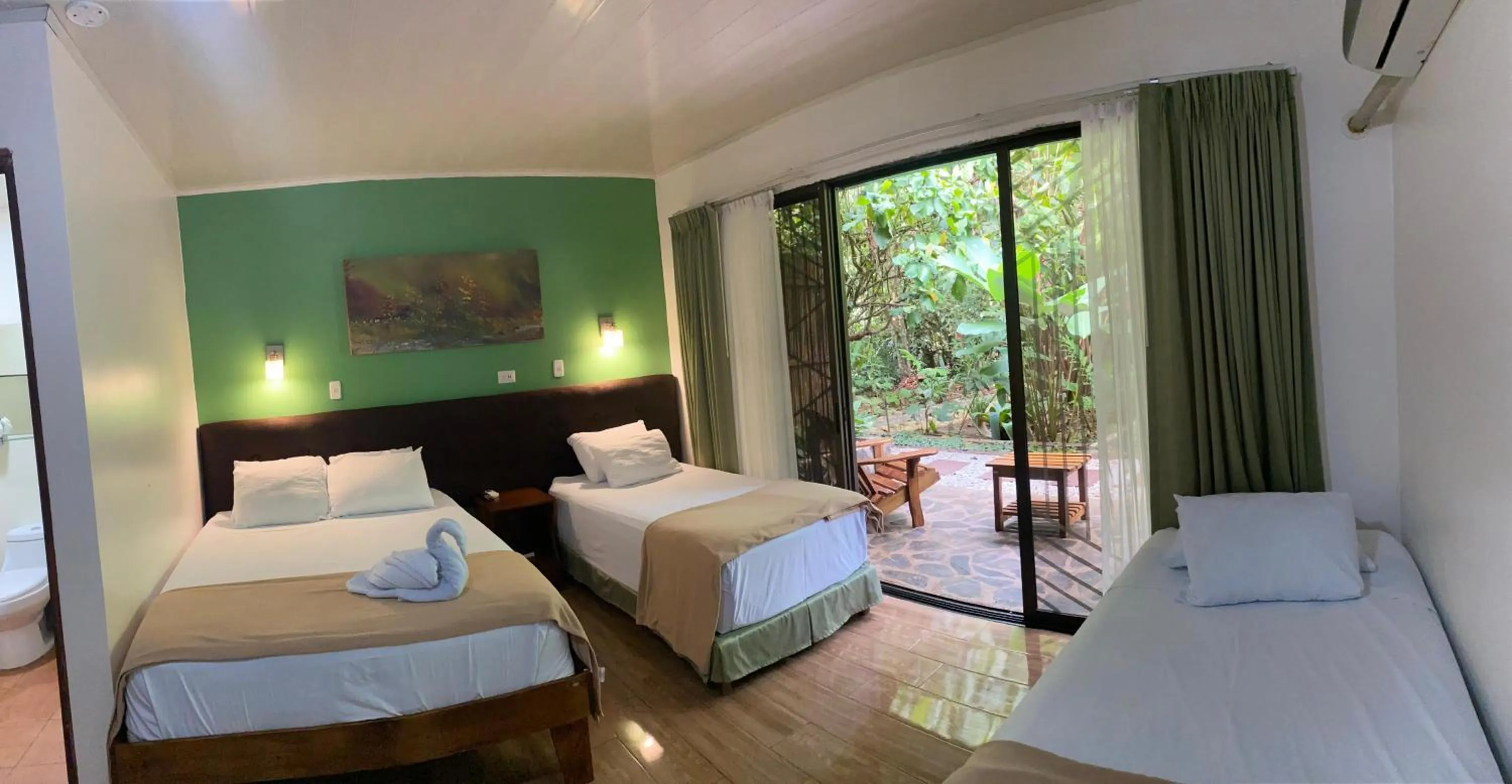 Bed in Tirimbina Rainforest Lodge