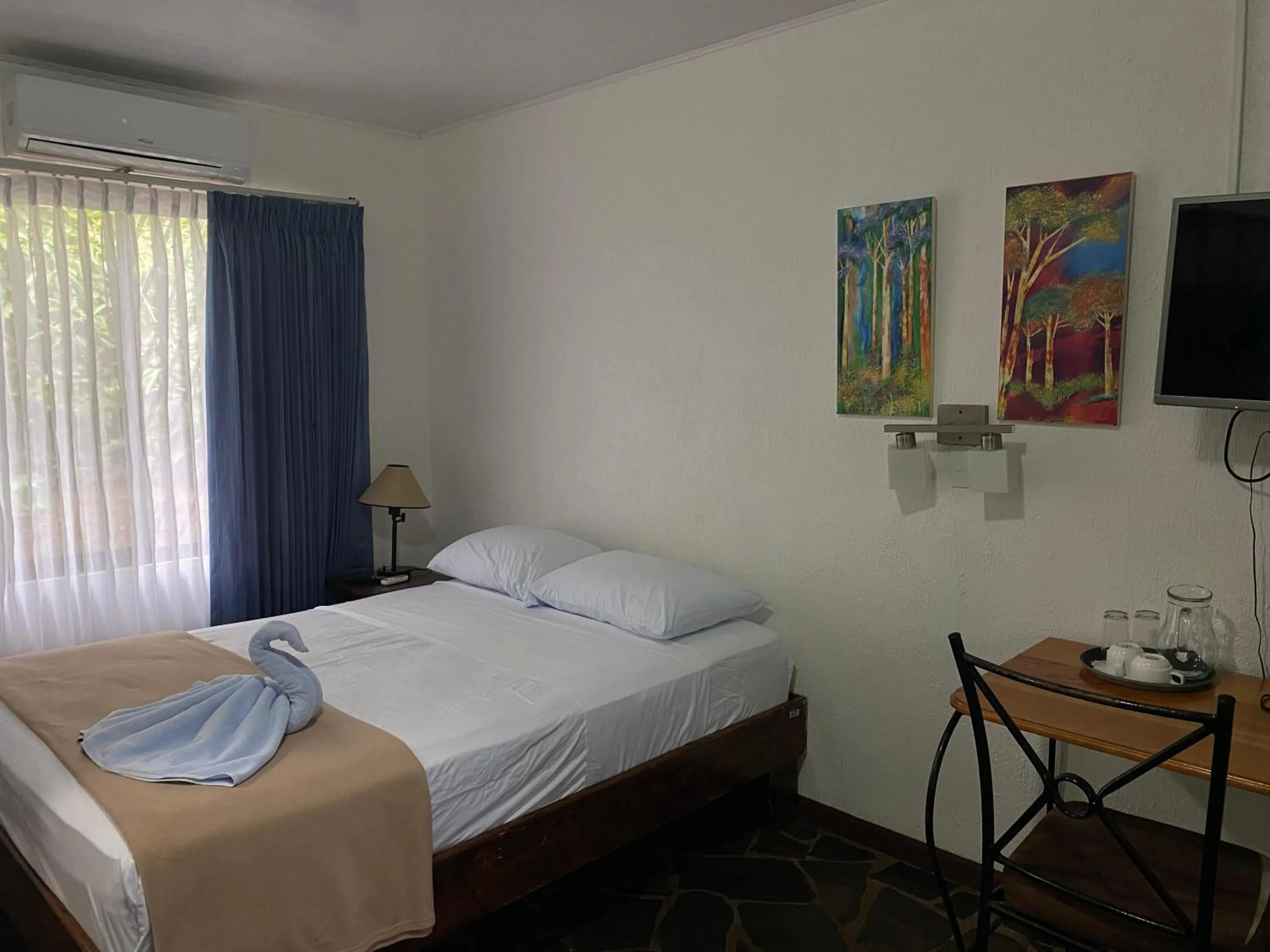 Bed in Tirimbina Rainforest Lodge