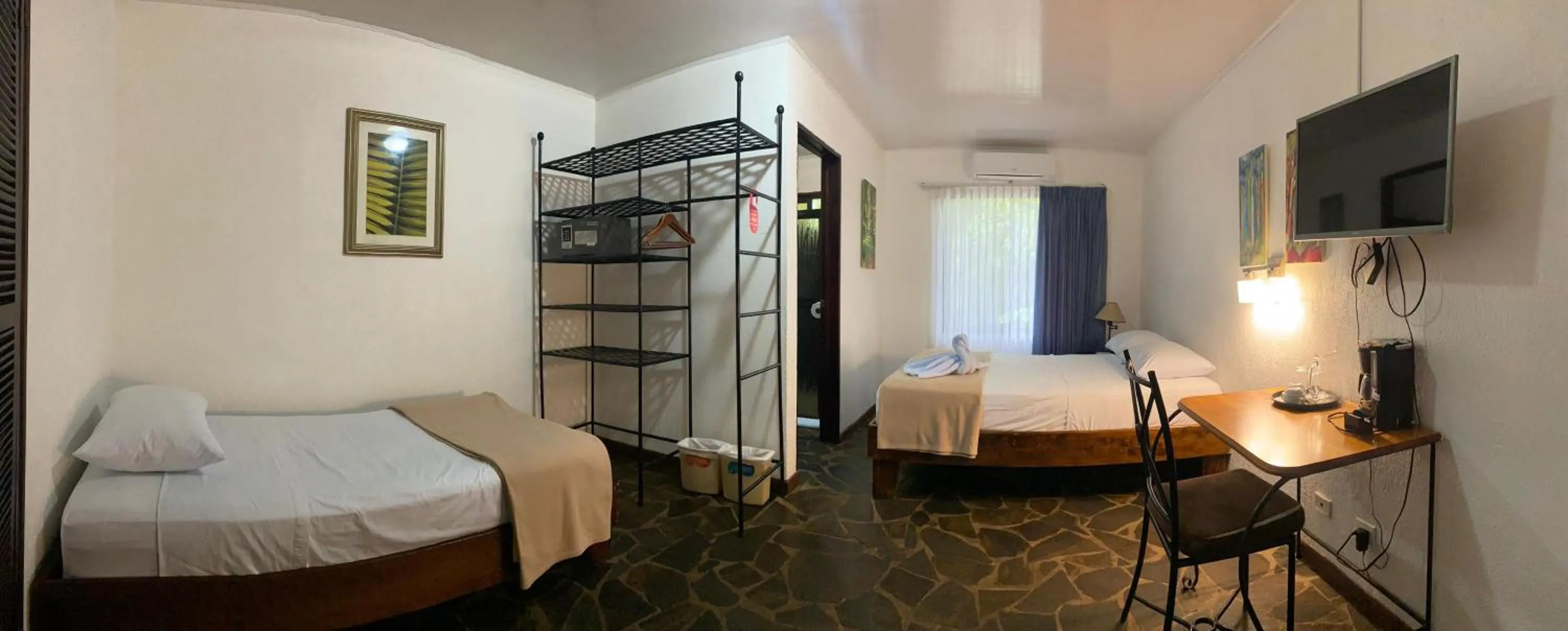 Bed in Tirimbina Rainforest Lodge