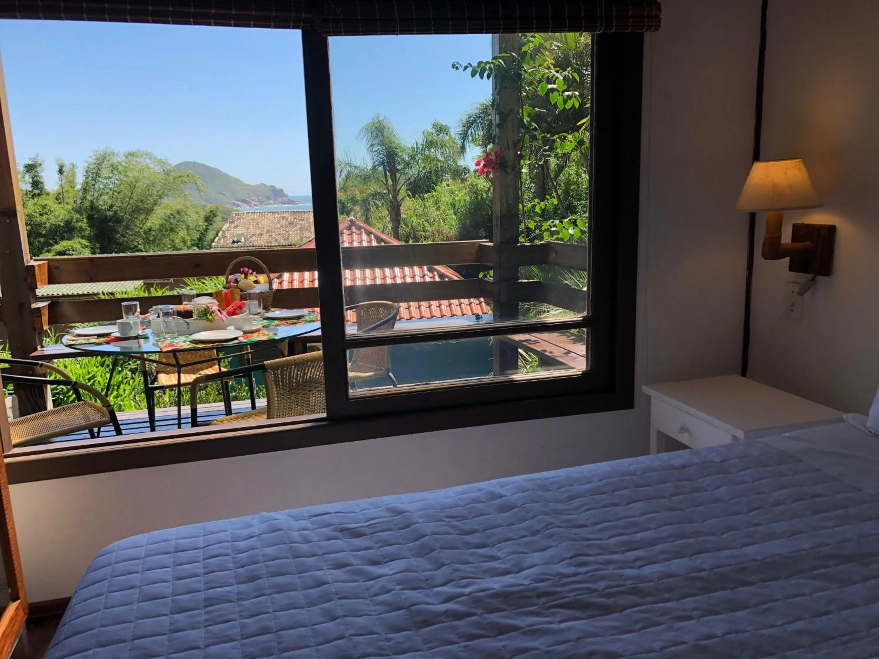 Bed in Pousada Bungalow