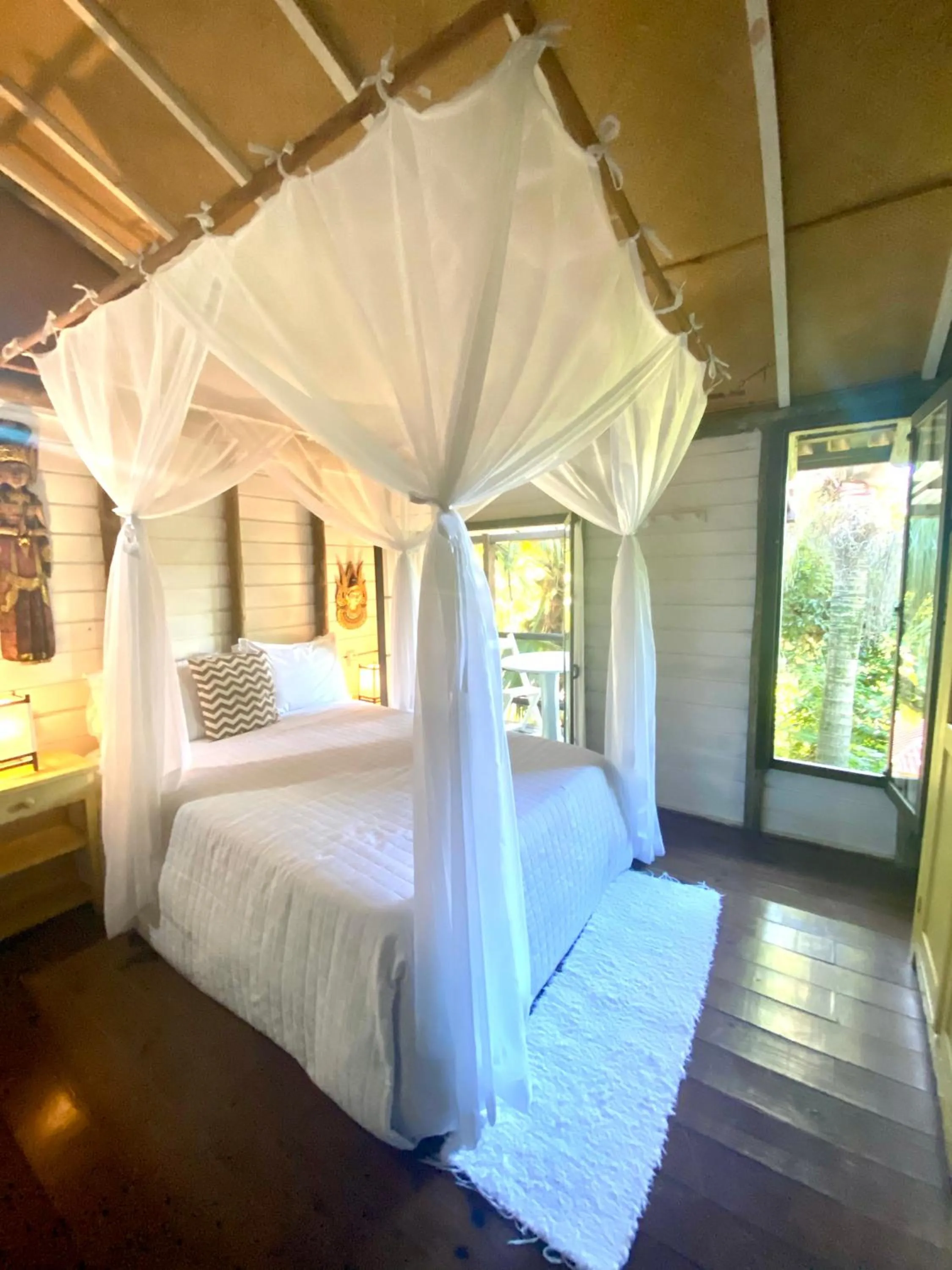 Bed in Pousada Bungalow