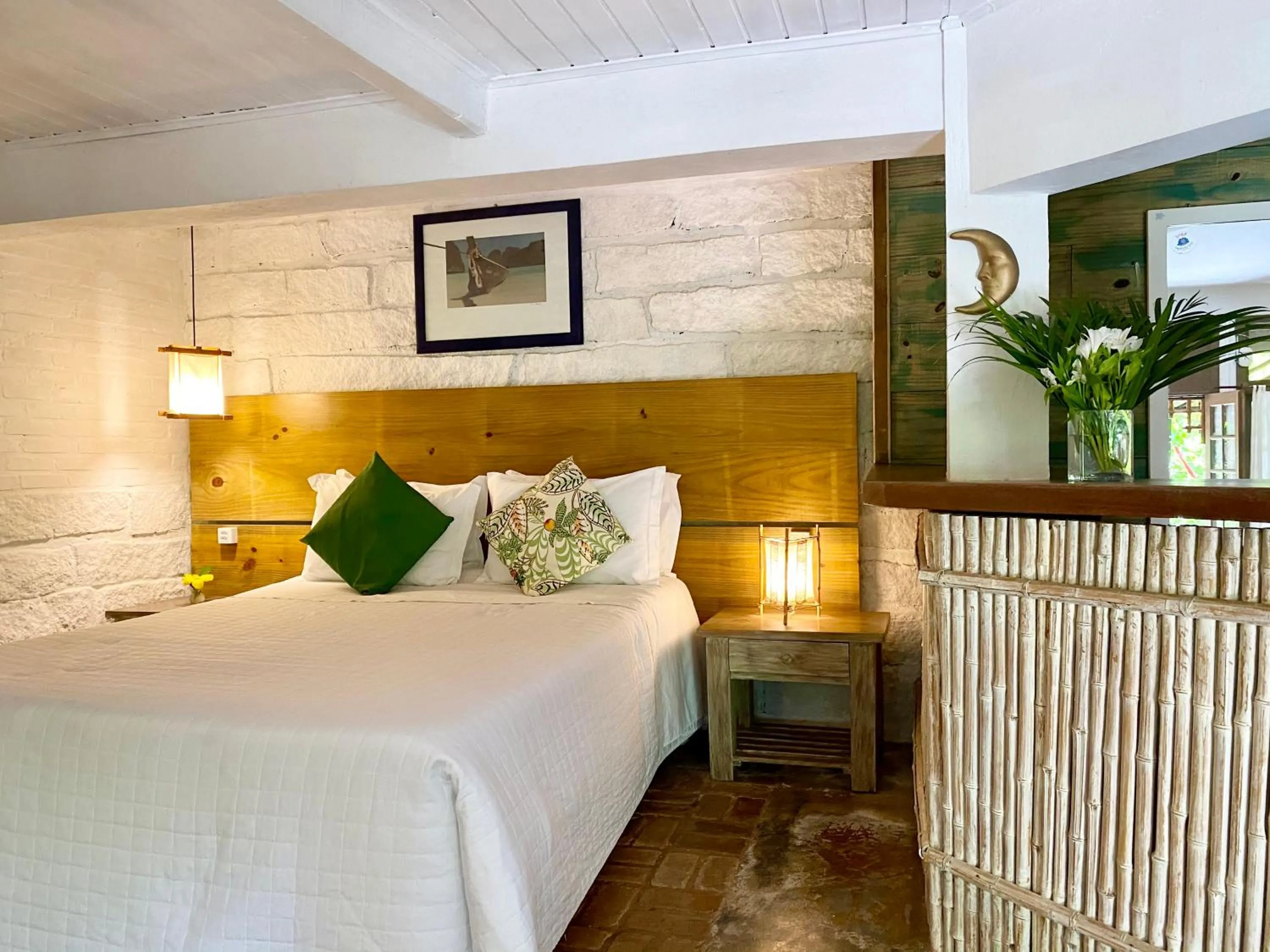 Bed in Pousada Bungalow